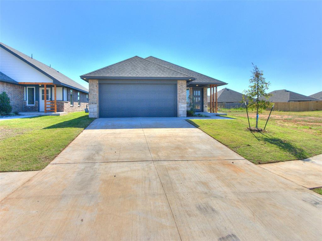 This stunning home in Palermo Place offers the perfect blend of style and function. The versatile open floor plan features a massive free-standing island overlooking the dining and living areas, ideal for entertaining. Thoughtfully designed with wood-look tile flooring, granite or quartz countertops, Samsung stainless steel appliances, and elevated ceilings, this home is both elegant and practical. Enjoy the privacy of a fully fenced backyard, beautifully complemented by an upgraded landscaping package, front stonework, and an elite 8/12 roof pitch for unbeatable curb appeal. Beyond the home, Palermo Place offers exclusive built-in tornado safety features and in-ground storm shelters, providing peace of mind. The community boasts resort-style amenities, including a pool, fitness center, playground, clubhouse, and walking trails. With quick access to I-35, I-240, and I-44, commuting is effortless, making Tinker AFB, the University of Oklahoma, Paycom, Amazon, Devon, and top OKC attractions just minutes away. Homes in Palermo Place sell fast—don’t miss your chance to own this incredible property. Schedule your tour today!