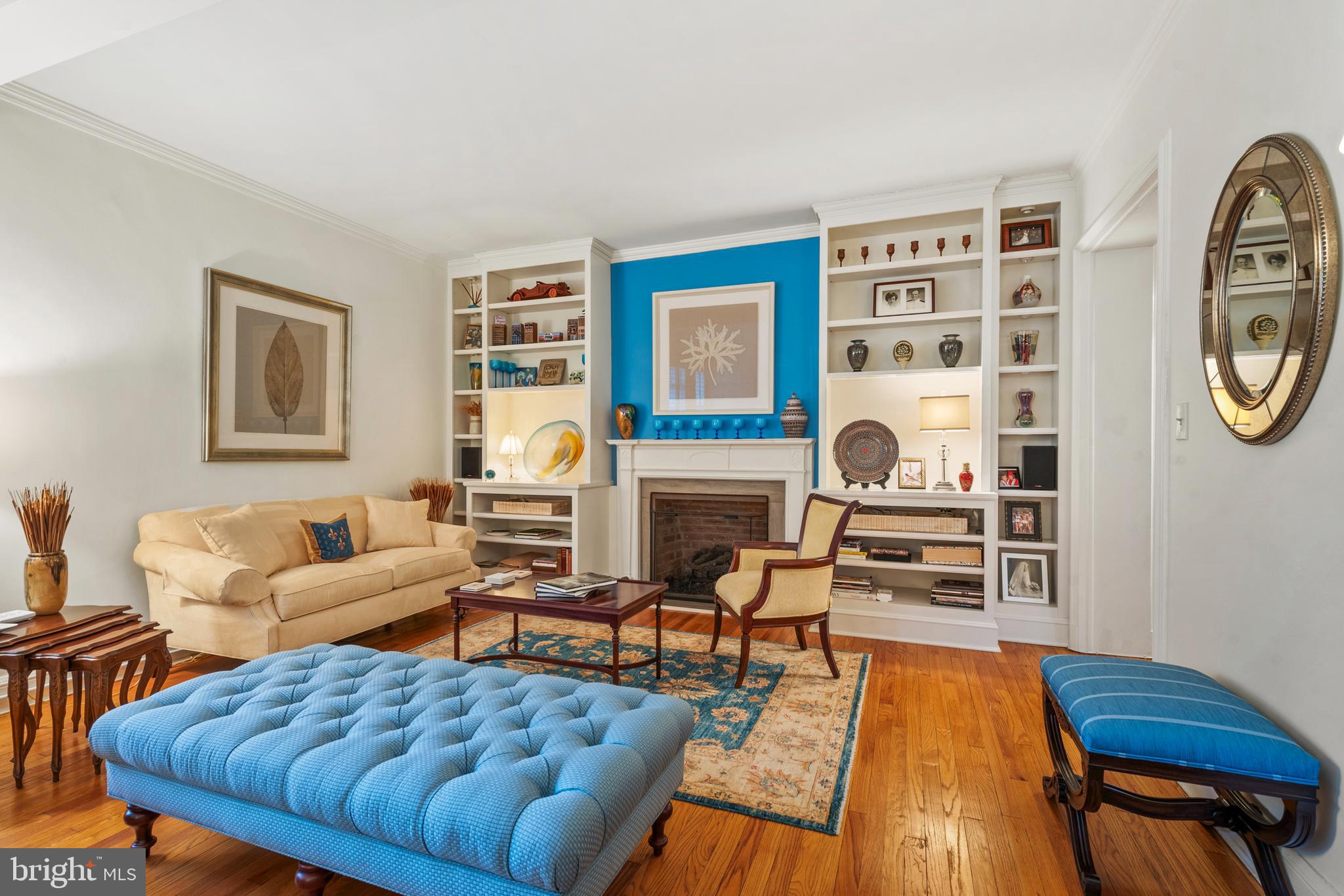 Welcome to 6 Upland Road, Unit F-2 — a gracious and beautifully appointed residence nestled in the heart of Roland Park, one of Baltimore’s most distinguished and architecturally rich neighborhoods. Originally designed as a 3-bedroom, 2-bath home, the current owners thoughtfully reimagined the layout—transforming one bedroom into a formal dining room and the original dining room into a warm and inviting family room. The floor plan can easily be returned to its original design, offering flexibility to suit your lifestyle.Rich hardwood floors flow throughout the home, complementing the updated kitchen,  which features granite countertops, stainless steel appliances, abundant cabinetry, and a custom built-in desk. The living room and family room are both enhanced by elegant built-in shelving, while plantation shutters throughout add timeless sophistication. A gas fireplace in the living room adds a lovely focal point. The apartment features numerous generous closets,  all outfitted with organizing systems.  Natural light from three directions make this unit feel bright and open. Both bedrooms are generously proportioned, offering serene retreats. The two full bathrooms are beautifully appointed—one with a walk-in shower enclosed in glass, the other with a tub/shower combination, also with glass doors. An additional study provides a quiet and refined space for work or reading.  This apartment features a stacked washer and dryer.A deeded, assigned garage parking space offers the convenience of city living with the ease of private access. In the building basement, a large private storage unit with 2 windows provides plenty of room for luggage, bicycles, seasonal decorations, etc.  It is possible to enter the building and unit without stairs from  the Carlowe Road entry of Building 3 (under awning) .  The unit is served by an elevator with only 2 units per floor. Roland Park is an amazing, historic neighborhood,  originally laid out by Frederick Law Olmstead. Its  charming homes, windy streets,  and miles of foot paths make it one of Baltimore's most treasured neighborhoods. This condo is just a short walk to the fine dining of Petit Louis, the casual dining of Johnny's, Eddies Grocery (who will also deliver!), Starbucks, the Public Library, numerous shops, etc!  Walk to Johns Hopkins main campus or Hampden with all its fun shops and restaurants, Classic in style and thoughtfully updated, this Roland Park gem offers the perfect blend of charm, comfort, and understated elegance.  6 Upland is proud to be celebrating its 100 birthday this month!