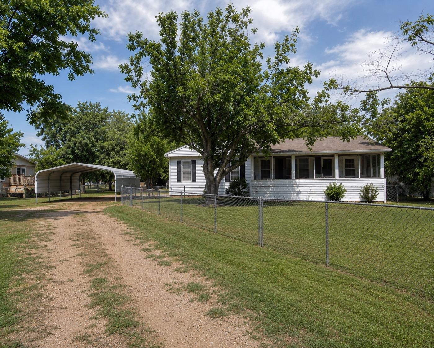 Escape to peaceful country living with the convenience of being just minutes from town! This 3-bedroom, 2-bath manufactured home sits on 1.84 unrestricted acres just minutes from Marble Falls, a rare opportunity to find this much space so close to town. Offering plenty of privacy and flexibility with no HOA restrictions, the property includes three storage buildings, perfect for hobbies, equipment, workshop space, or additional storage. Enjoy wide open spaces, room for pets, gardening, or outdoor entertaining while still being close to shopping, dining, and everyday conveniences. Whether you're looking for a full-time residence, investment property, or weekend retreat, this property offers great potential and the freedom to make it your own.