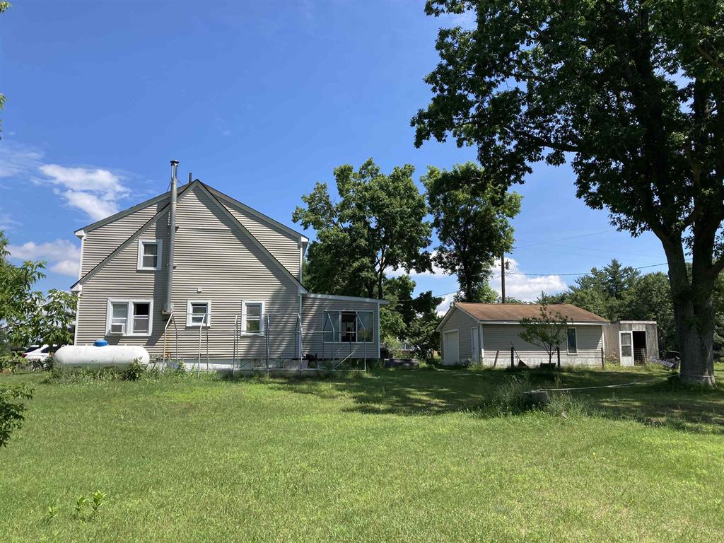 600+/- FEET ON ABBOTT LAKE and nearly instant access to trails and National Forest make this 3br, 2 bath home or recreational property the perfect place to hang your hat! Full unfinished basement, 1.5 car garage, large enclosed porch and an upstairs studio apartment with kitchen and full bath is perfect for family or company.
