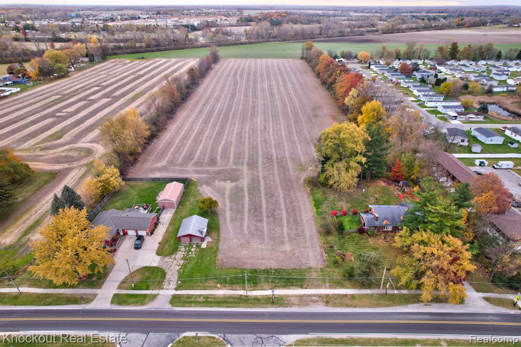 Birch Run's next development? Need farmland? Opportunities are endless with this 10 acre parcel across from the schools in the Village of Birch Run. The 10.84 acre parcel is adjacent to the Birchwood Farms community and has access to city water and sewer. Currently, the tillable land is farmed and tiled (2015). Property has been surveyed and there is 177 feet of road access from Church St. that widens approximately 220 feet into the property.