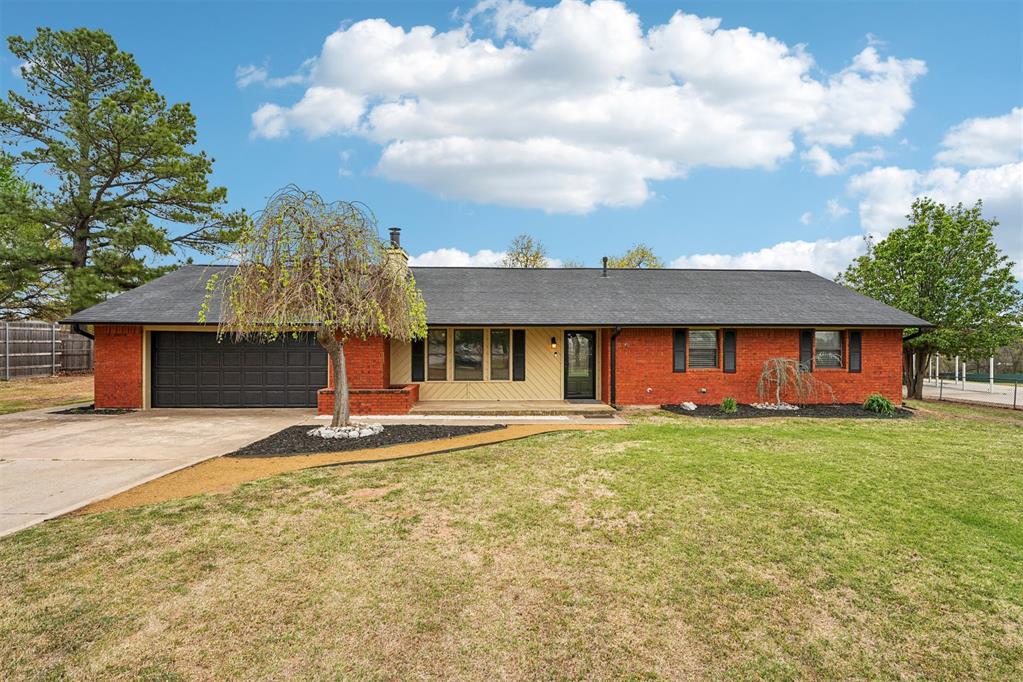 Welcome to your own slice of country living just minutes from Norman! Situated on 1.43 acres, this charming ranch-style home offers 3 bedrooms, 2 bathrooms, and approximately 2,137 square feet of comfortable living space with room to spread out inside and out.Step inside to find a spacious layout featuring a large living area with beautiful wood flooring, built-ins, and a cozy fireplace. A second living space or bonus/media room provides flexibility for a game room, TV room, or home office, perfect for today’s lifestyle. The kitchen is well-equipped with stainless steel appliances, ample cabinetry, and generous space for gathering and entertaining.Outside is where this property truly shines! Enjoy wide open space with endless possibilities...bring your hobbies or simply enjoy the privacy and room to roam. The property includes a detached 24x24 workshop, a 12x12 storage shed, and a large in-ground storm cellar for added peace of mind.Whether you’re looking for space, functionality, or a place to make your own, this property offers the perfect blend of country feel with convenient access to town.Located in Norman Public Schools. Buyer to verify all information.