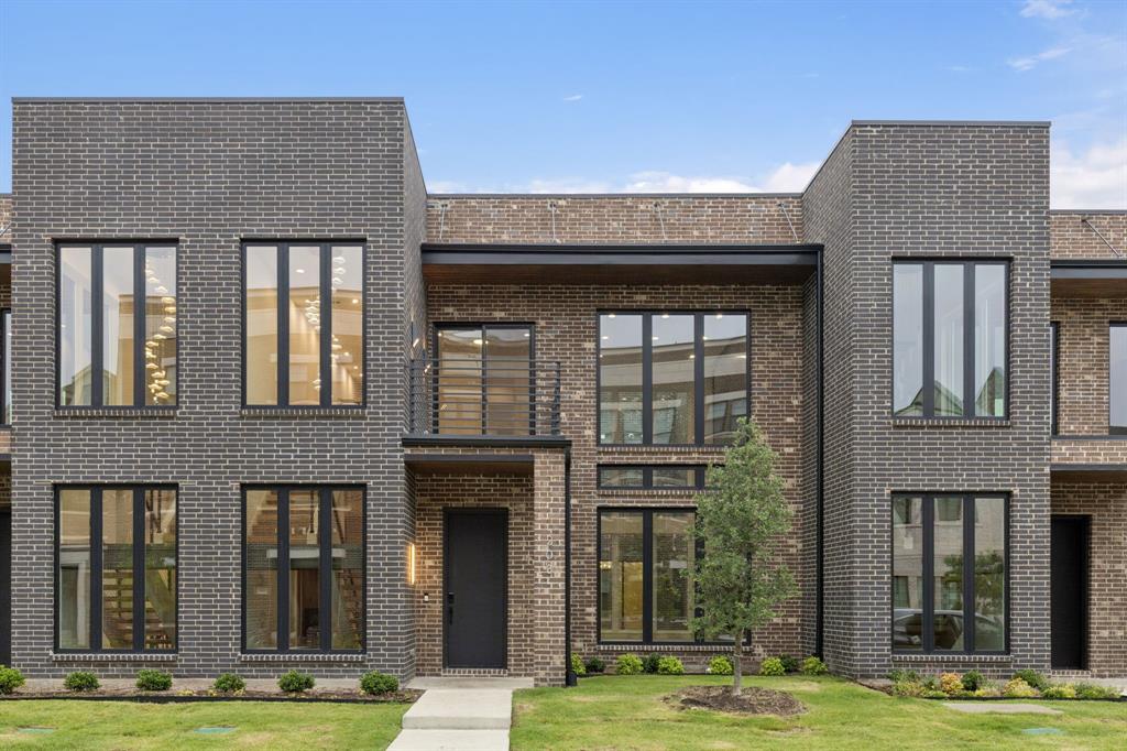 Feel like you're living in NYC or LA in this sleek, modern townhome bursting with style and sophistication. Perfectly positioned in the heart of booming Downtown Roanoke, this rare 4-bedroom, 4.5-bath is drenched in natural light thanks to walls of windows and soaring ceilings, creating a bright, open feel throughout.
Designer touches abound—from the show-stopping two-story fireplace to statement chandeliers and an upscale bar with wine and beverage fridge. The open-concept kitchen seamlessly connects to a private courtyard via oversized sliding doors—perfect for entertaining or unwinding in style.
The first-floor primary suite offers a spa-like retreat with a luxurious bath and oversized walk-in closet. Upstairs, you’ll find three additional bedrooms, two full baths, and a private balcony—ideal for guests, multigenerational living, or work-from-home flexibility.
This home is also elevator-ready, offering the option to easily add one for convenience and future accessibility. Enjoy a true lock-and-leave lifestyle with HOA-maintained exterior and front yard. The oversized 2.5-car garage provides extra space for storage, a golf cart, or hobby area.
Just steps to Roanoke’s top-rated restaurants, boutique shops, and the Rec Center. Quick access to Hwy 114, Southlake Town Square, and DFW Airport makes commuting a breeze. A rare gem that blends urban energy with small-town charm—don’t miss this one-of-a-kind opportunity.