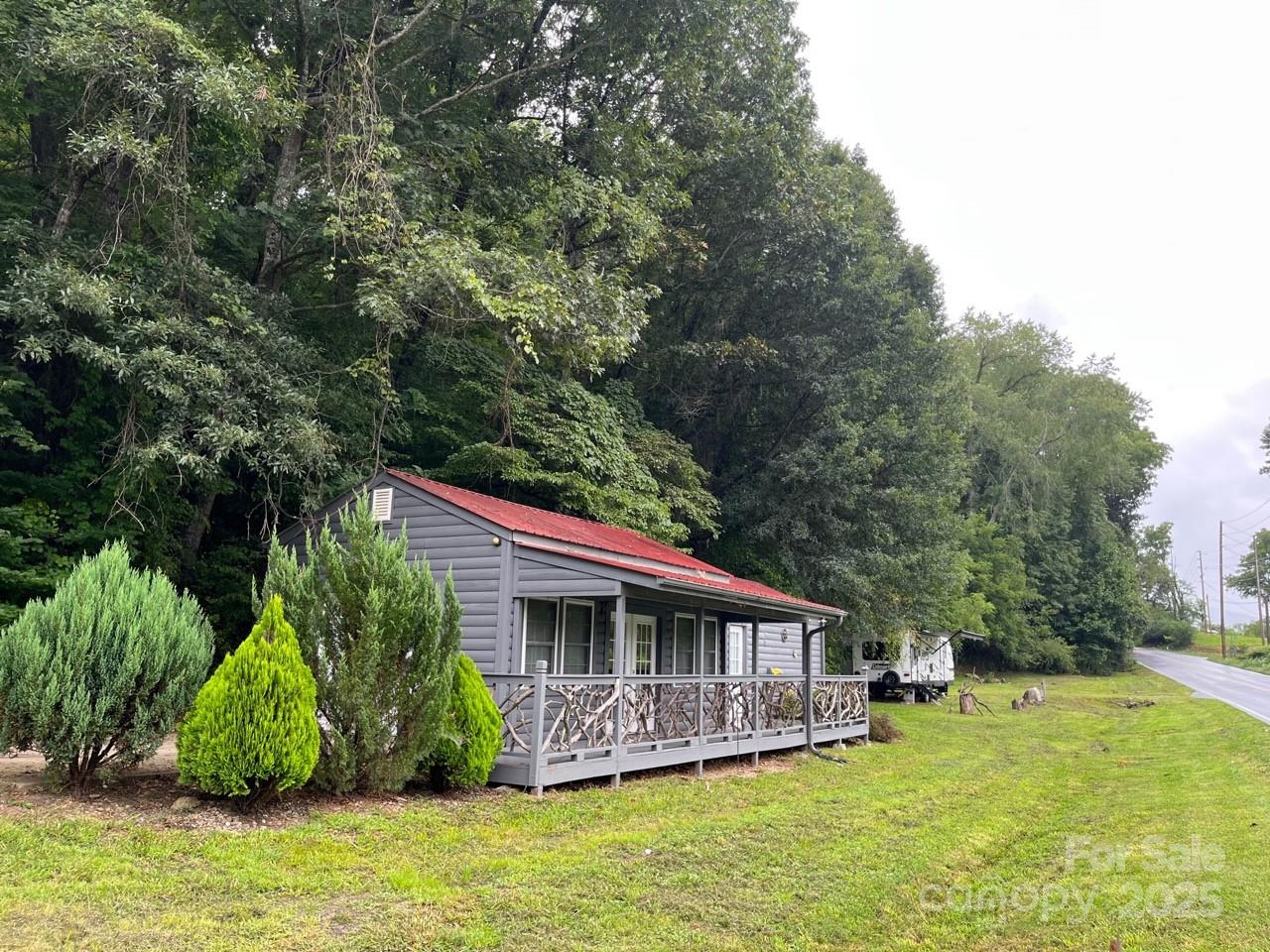 Open Use Zoning. No Deed restrictions. Short term rentals allowed. Commercial, retail, residential, multi-family, r/v park, medical, manufacturing, auto service and sales lot ETC. allowed! Circular road across the top of the property for additional residential or commercial buildings with beautiful 180 degree south views to the mountains with million+ dollar homes across valley. 575 feet of road frontage on Cane Creek Road with multiple entrances and exits. Great site visibility for signage. Previously leased for stain glass studio, medical center/physical therapy, residential studio home, warehouse, auto body, auto sale lot and r/v sites. Owner/Broker. Price lowered $25.000.