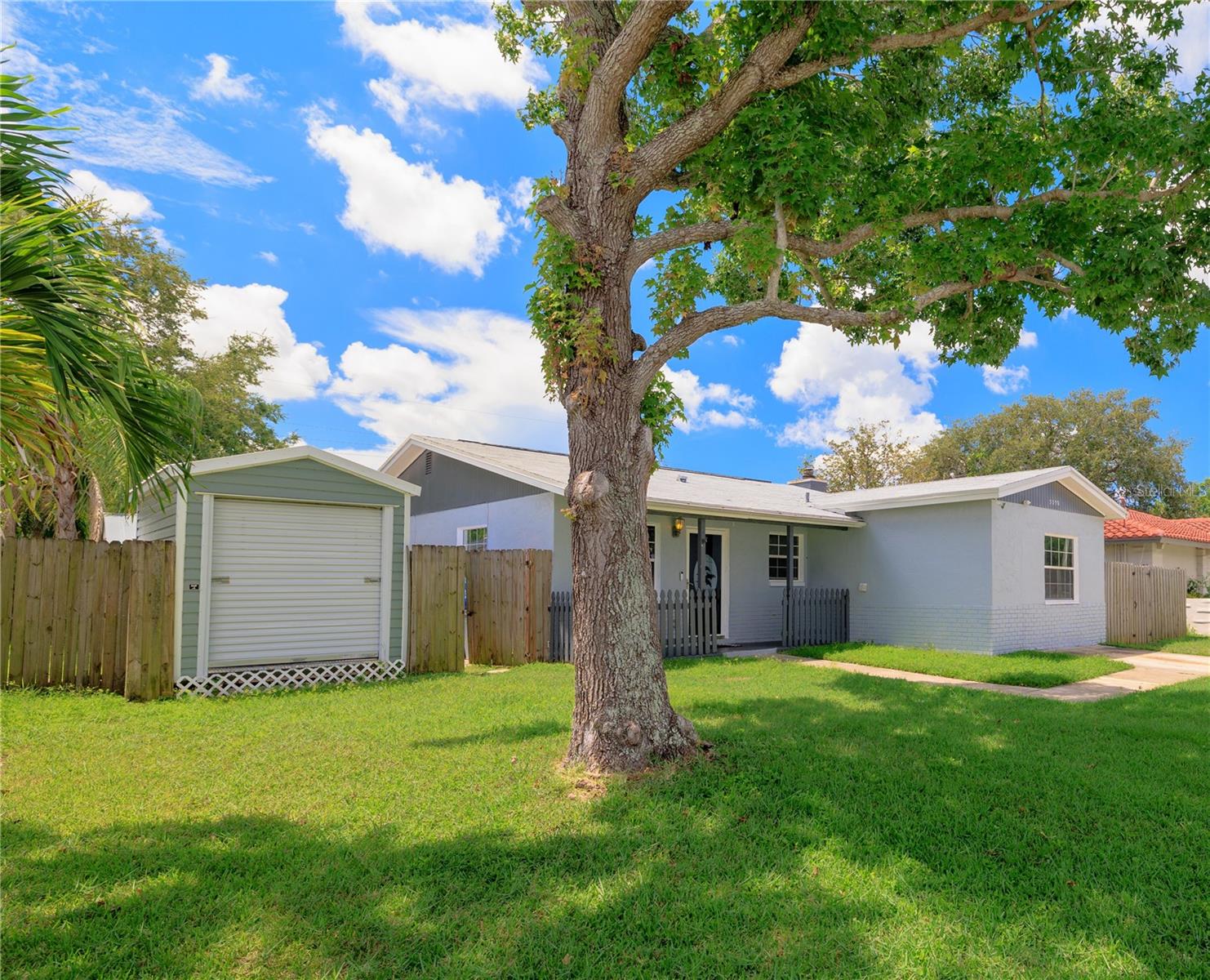 Welcome to this 3-bedroom, 2-bath block home in the heart of Pinellas Park, offering over 1,600 sq. ft. of living space including a versatile bonus room and sunroom.  As you enter through the front door, you’re greeted by a beautiful kitchen with a built-in workspace, perfect for cooking and staying organized. The living area features a cozy fireplace, while the large bonus room and sunroom provide flexible space for a home office, playroom, or extra living area.  Outdoors, enjoy the in-ground pool and low-maintenance yard, ideal for Florida living. The property also includes three storage sheds, with the main oversized shed (nearly the size of a one-car garage) conveniently accessible from the front yard. Additional updates include all new plumbing throughout, solar panels and roof for energy efficiency and long-term savings.  This home has been lovingly cared for and is ready for its next chapter. Conveniently located near shopping, dining, and just a short drive to the beaches, downtown St. Pete, and Tampa International Airport, this home offers both comfort and convenience.