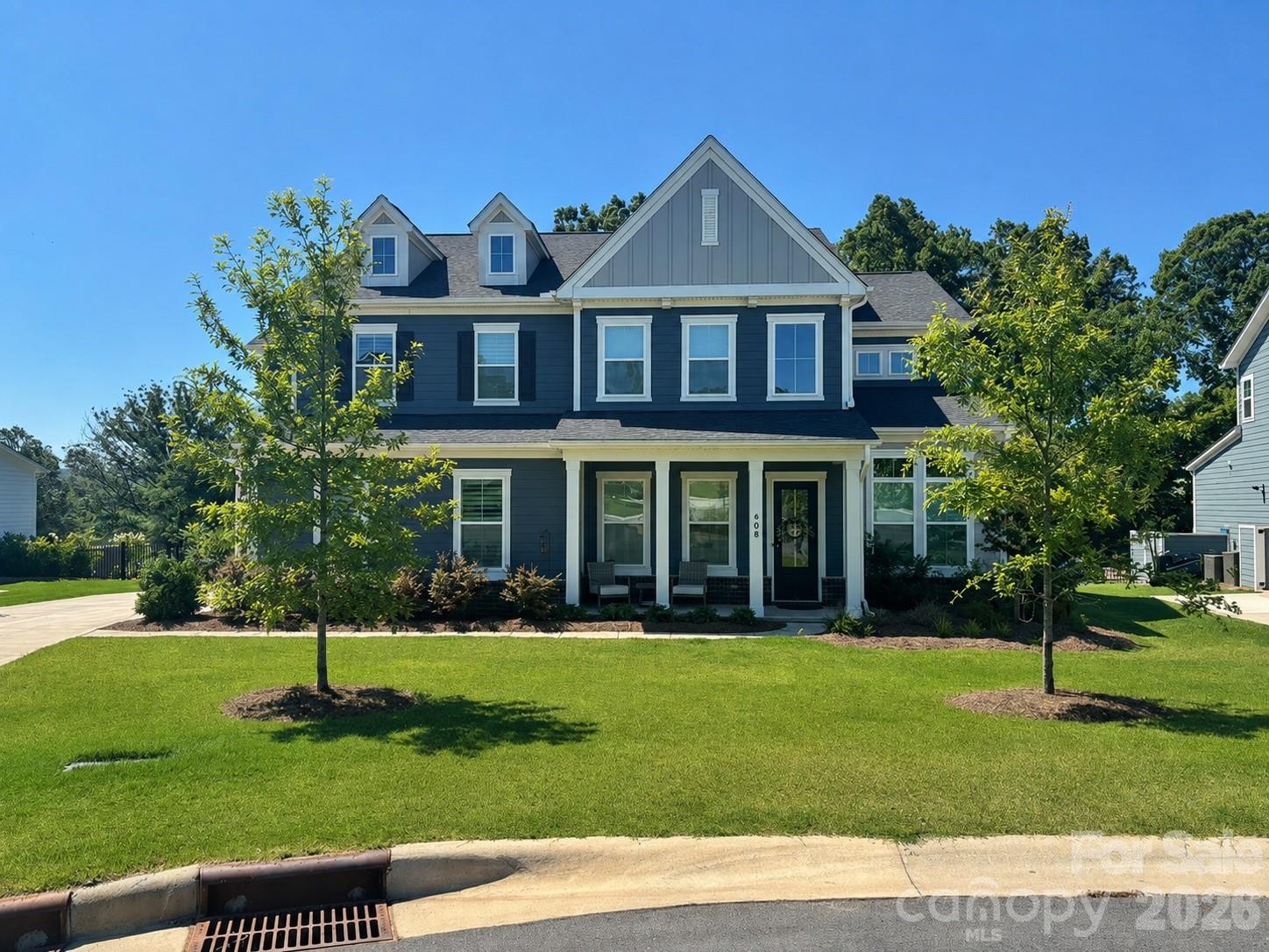 Coming Soon! Nestled on a premium cul-de-sac lot, this beautifully maintained home offers exceptional privacy, wooded conservancy views, and seasonal views of Lake Wylie.