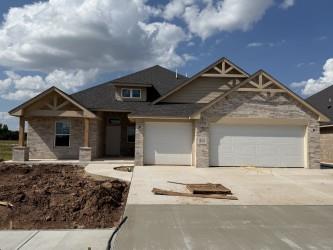MOVE IN READY IN 45 DAYS! This beautiful home blends modern design with functional living. Featuring an open floor plan, with the living room offering a vaulted ceiling and large windows that frame the view of the covered back patio. The gourmet kitchen offers state of the art appliances, and a huge center island. The luxurious primary suite is complete with a freestanding tub, walk-in shower, and an oversized walk-in closet that is conveniently connected to the laundry room. The secondary bedrooms each have their own ensuite bath, while the versatile office space can easily serve as a fourth bedroom. This home offers a rec room, perfect for play or relaxation. Additional amenities include a beautiful fireplace, powder bath, mud bench/drop zone, designer lighting, tiles, granite countertops and much more!
**For a limited time only, we are offering a $9,000 Builder's Special and $14,745 Early Bird Special. Go under contract this month on 2233 SW 160th Street and receive the Early Bird Special: FREE upgraded tile & flooring ($14,745 value) plus the $9,000 Builder's Special for upgrades of your choice. Total value of $23,745.