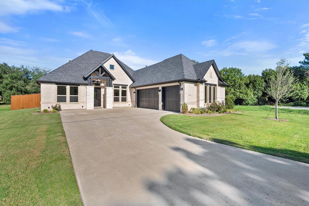 Stunning 1-Story New Global Luxury Home! Experience unmatched elegance in this beautiful model home located in a quiet cul-de-sac within a charming single-street subdivision. The open-concept layout seamlessly integrates the living, dining, and kitchen areas, highlighted by a warm Austin stone fireplace with gas logs and a raised hearth. The chef's kitchen boasts stainless steel double ovens, a large island with a breakfast bar, custom transom cabinets, and a spacious pantry. Unwind in the master suite featuring a spa-like ensuite bathroom, complete with a separate tub, shower, and dual vanity with quartz countertops. Enjoy entertainment options with a dedicated media room and generously sized secondary bedrooms. Step outside to the expansive fenced backyard, which includes a covered porch ideal for relaxation. Set on a large lot, there is plenty of space for a pool, swing set, or garden.  Special financing available with use of our preferred lender.