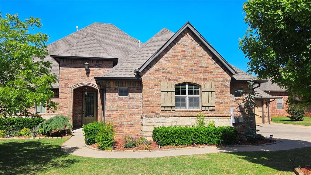Welcome to this stunning 4-bedroom, 4.1-bath residence located in the secure community of Covell Village. With classic architecture and thoughtful upgrades throughout, this home delivers comfort, style, and functionality. Community features include a well-maintained swimming pool and controlled access gates. Inside, the layout flows seamlessly, with rich wood cabinetry, detailed trim work, hardwood flooring, and graceful architectural accents adding warmth and character. The main living area includes a gas fireplace flanked by custom shelving, creating a welcoming and refined atmosphere. A separate home office with generous natural light and tray ceiling detail offers a quiet and productive environment. A versatile bonus room on the first floor may be used as an additional living area, media room, or private study. The main suite features elevated ceilings, expansive windows, and a luxurious en suite with a soaking tub, dual vanities, walk-in shower, and an expansive closet. Three more bedrooms are also situated downstairs—one with a private bathroom, while the other two share a convenient Jack-and-Jill layout. Upstairs, you’ll find a generously sized multipurpose room complete with a full bath and closet, suitable for use as a fifth bedroom, playroom, or home theater. The chef’s kitchen is outfitted with an island, handcrafted cabinetry, gas cooktop, premium built-ins, granite surfaces, ample storage, and counter seating—ideal for both everyday use and entertaining. A recently enclosed sunroom or gym adds extra functionality and is not included in the listed square footage. Additional features include a 3-car garage with a built-in storm shelter, a wide covered patio, and a spacious backyard suited for gatherings and relaxation. Schedule your private showing today to experience all this exceptional home has to offer.