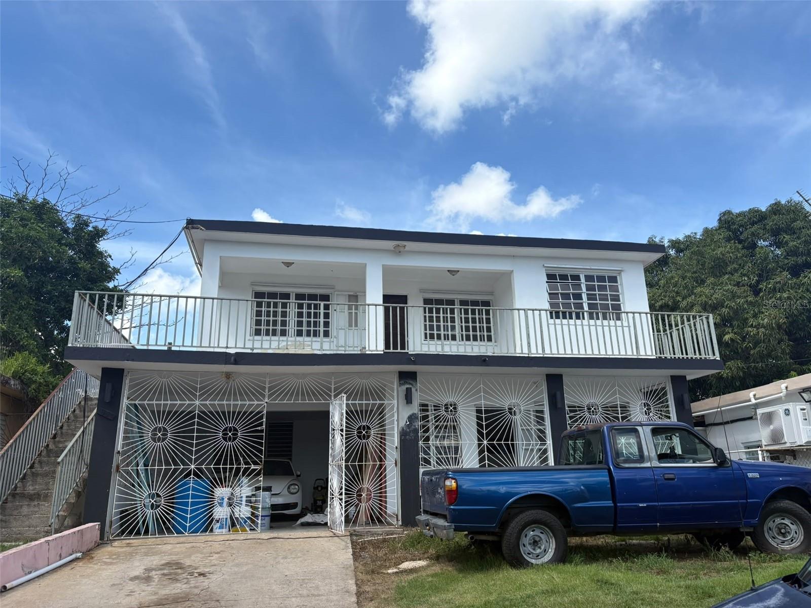 Excellent Investment Opportunity in San Juan! Ideally located in Urb. Hill Brothers, this two-story property sits conveniently between The Mall of San Juan and Avenida 65 de Infantería, offering easy access to major roads, shopping, services, and surrounding areas. The property is currently configured and used as two separate living spaces, providing excellent flexibility for an investor or owner looking for income potential.The first floor features 4 bedrooms and 2 bathrooms, while the second floor offers 2 bedrooms and 1 bathroom. The property sits on an approximately 5,227 sq. ft. lot, providing a generous outdoor area and additional potential for improvements.The home requires repairs and updating, which is reflected in the attractive asking price and creates an opportunity for the new owner to renovate and maximize the property's potential. Conveniently located approximately 10 minutes by car from the Teodoro Moscoso Bridge, with easy access to Luis Muñoz Marín International Airport, major highways, shopping, and key areas of San Juan. A property with strong potential in a well-connected location.