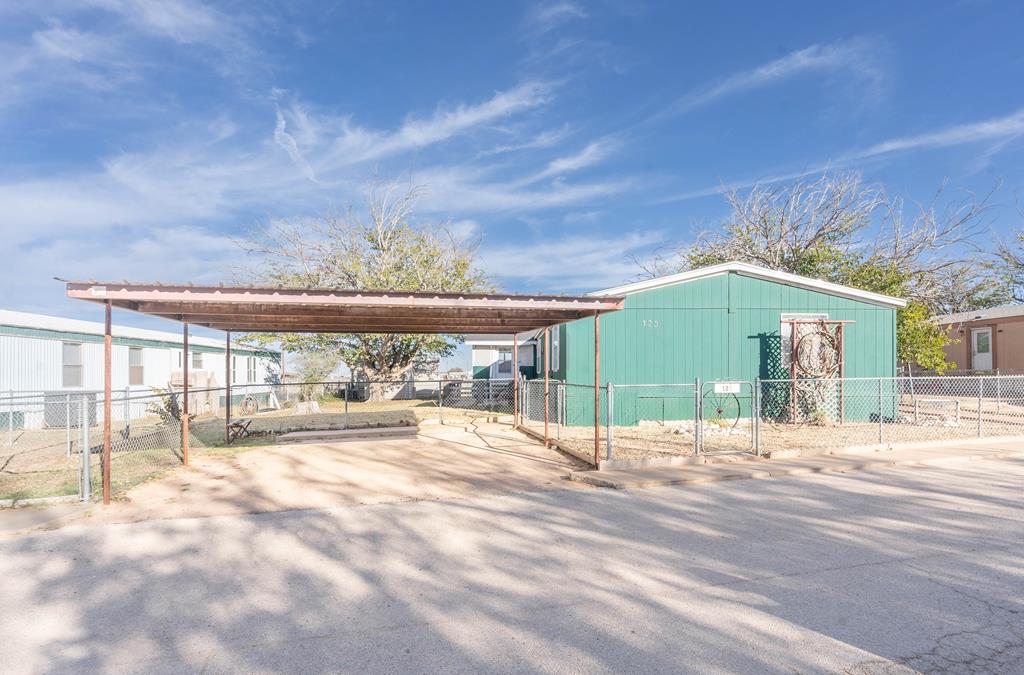Discover the perfect blend of modern comfort and small-town charm with this beautifully built 3-bedroom, 2-bath home. Recently refreshed with completely fresh paint, this residence features an inviting open-concept floor plan that flows seamlessly—ideal for both daily living and entertaining. The kitchen boasts upscale finishes and generous counter space, while expansive windows fill the interior with natural light. Energy-efficient systems enhance functionality, and outside you'll find a fully fenced yard plus a storage building, offering extra convenience.
