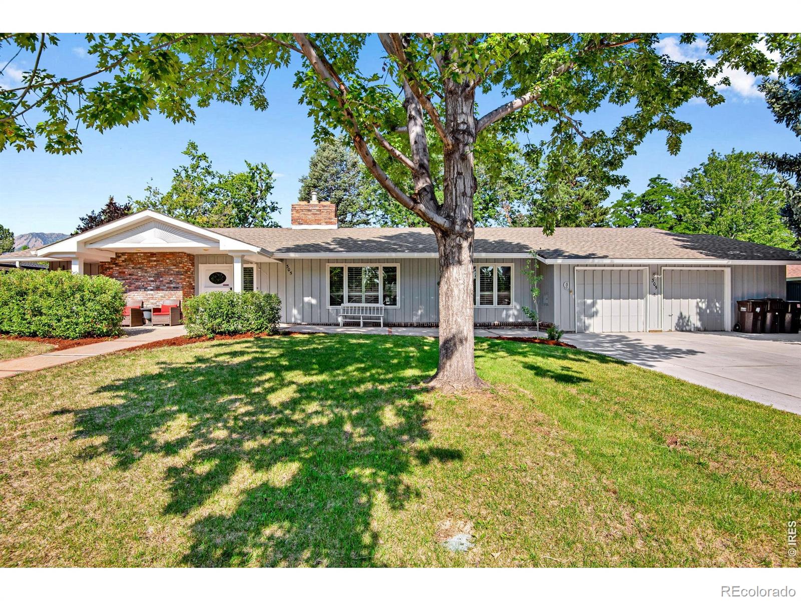 Nestled on a private .32-acre lot in one of Boulder's most established neighborhoods, this spacious ranch-style home offers 2,800 square feet of comfortable, single-level living and an outstanding opportunity to update and personalize to your own style.The thoughtfully designed floor plan features generous living spaces, vaulted ceilings, hardwood floors and large windows that fill the home with natural light. The living room opens to the dining area and kitchen, creating an easy flow for everyday living and entertaining. The extra large primary suite includes a walk-in closet, while additional bedrooms and living areas provide flexibility for family, guests or a home office.Step outside to a fully fenced backyard where mature trees, established landscaping, rock gardens, and an expansive patio create a private setting for relaxing or entertaining.Just minutes from Downtown Boulder, the University of Colorado, neighborhood parks, shopping, dining, and miles of trails, this home offers an exceptional location with endless possibilities to make it your own. Enjoy Where You Live!