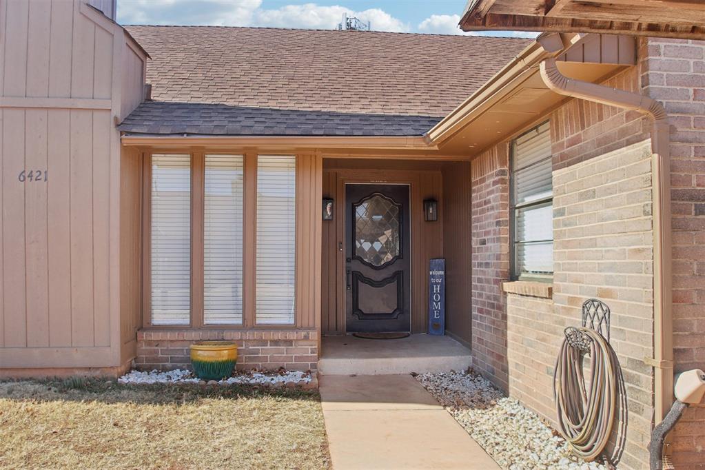 Thoughtfully updated and full of versatility, this one-story townhouse in NW Oklahoma City offers comfort, function, and features that set it apart. The inviting main living area is anchored by a wood-burning fireplace and flows seamlessly into the kitchen and dining space, creating an easy layout for everyday living.Recent improvements include fresh interior paint throughout, refreshed countertops, a new dishwasher, and a refinished cast-iron tub in the secondary bathroom, with the refrigerator remaining. Major system upgrades were completed in 2023, including a new furnace, A/C system, and hot water heater, providing added confidence for the next owner.While most homes in the addition feature an interior patio, this home offers a truly standout flex space unique to this unit, delivering exceptional versatility for entertaining, hobbies, play, or relaxing. The Florida room provides additional usable space and is not included in the stated square footage.Exterior highlights include a new back fence (side fences being replaced in 2026), front sprinkler system, and a low-maintenance setting. The attic offers ample storage with standing room, a rare and valuable feature. A new roof is planned for Spring 2026, pending completion of the HOA insurance claim process.Conveniently located near shopping, dining, and major roadways, this home combines thoughtful updates with flexible living spaces.