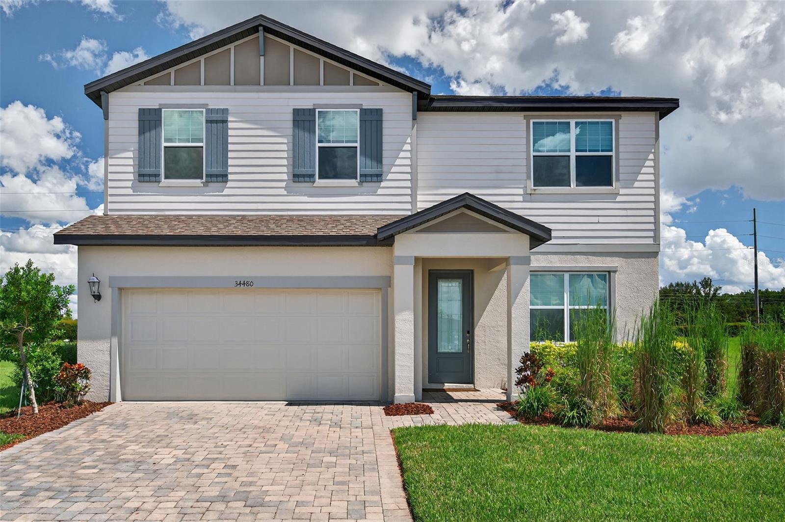Welcome to 34480 Wynthorne Place, nestled in Wesley Chapel’s highly sought-after master-planned community of Watergrass.

This 2023 Meritage built home in the village of Stonebrook, spans nearly 2,600 heated square feet! This thoughtfully designed residence offers four spacious bedrooms plus a large loft upstairs, providing flexibility for modern living. The home is truly move-in ready, with luxury vinyl plank flooring throughout the downstairs, freshly steamed carpet upstairs, and upgraded finishes at every turn. The chef’s kitchen is this home’s showpiece, featuring timeless white cabinetry, elegant quartz countertops, stainless steel appliances, designer hardware, and stylish light fixtures. The open-concept layout flows seamlessly from the kitchen to the dinette and into the expansive living area, perfect for entertaining or relaxing at home. At the front of the home, a versatile flex room awaits—ideal for a formal dining space, private office, or playroom—the options are endless.

Upstairs, all bedrooms are generously sized, while the bathrooms showcase modern, timeless finishes that balance beauty AND functionality! With its fresh, clean presentation, this home is as practical as it is stunning.

This impeccably maintained home sits gracefully on a premium oversized pie-shaped lot at the end of a quiet cul-de-sac—offering both privacy and plenty of room to create your dream outdoor oasis.

Beyond the home itself, Watergrass is a community that truly enhances your lifestyle. Residents enjoy resort-style amenities, including a clubhouse with catering kitchen and meeting room, a six-lane Olympic pool, a zero-entry pool with splash zone, a state-of-the-art fitness center, tennis and basketball courts, dog parks, trails, and an abundance of parks and green spaces throughout the neighborhood. The location is equally unbeatable—minutes from top-rated schools, hospitals, shopping, dining, and with convenient access to I-75 for an easy commute.

Don’t miss the opportunity to own this exceptional property in one of Wesley Chapel’s most desirable communities—34480 Wynthorne Place is ready to welcome you home.

***ASK ABOUT OUR PREFERRED LENDER INCENTIVES AND ALL OF OUR OTHER PROMOS!***
