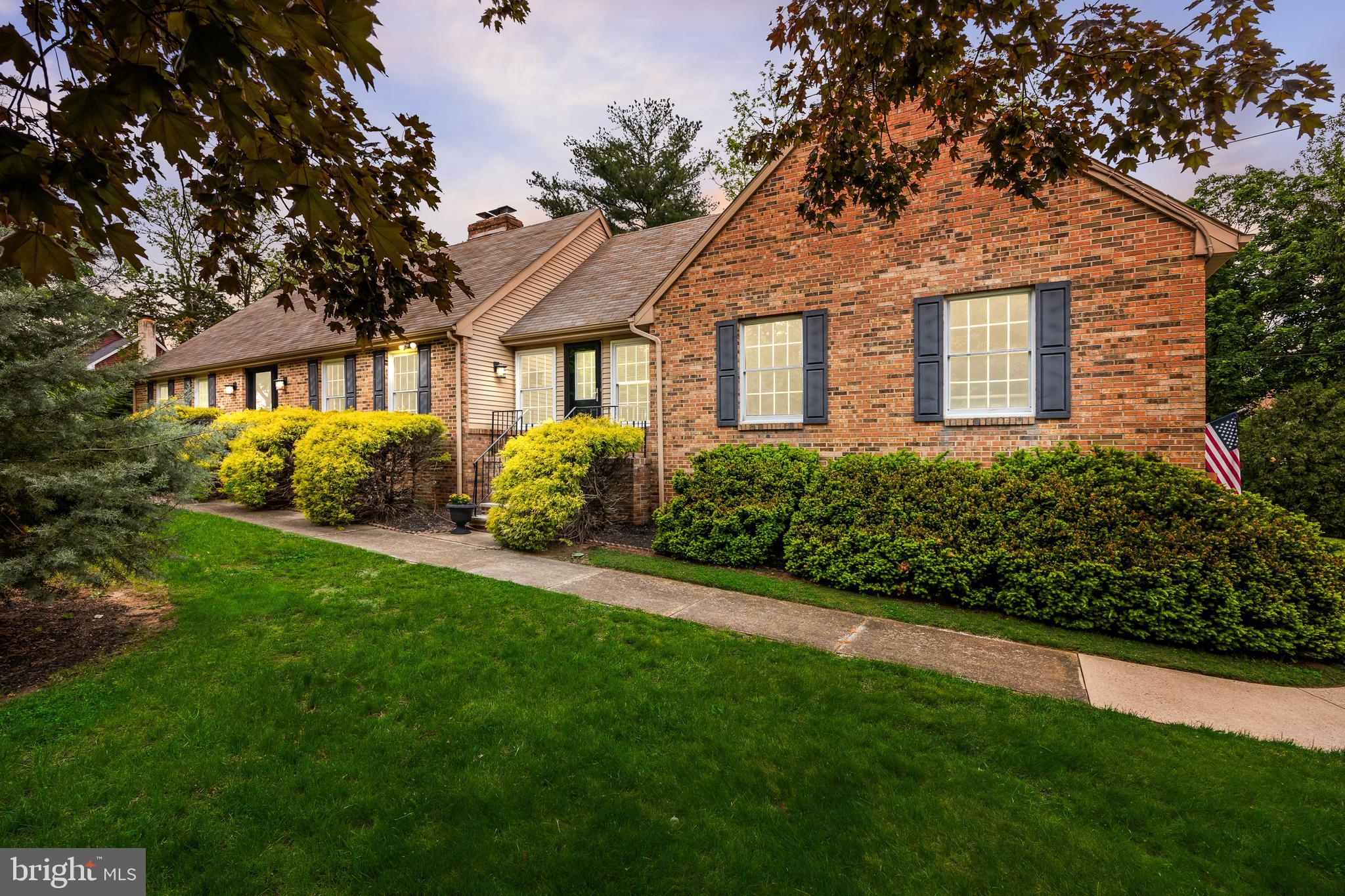 Welcome home to this beautifully updated 3 bedroom, 3 full bath Gary Gardner custom-built home featuring a timeless brick exterior, oversized 1,501 sq ft basement with high ceilings, attached 2-car garage, and exceptional curb appeal, all perfectly nestled in the heart of Mt. Laurel. Situated on a beautifully expansive half-acre-plus lot, this exceptional property offers a huge side yard and endless outdoor potential for entertaining, gardening, recreation, or future possibilities. From the moment you arrive, you'll appreciate the inviting curb appeal highlighted by a well-maintained asphalt driveway, mature landscaping, and multiple entry points welcoming guests directly into either the living or dining room. Step inside and immediately notice the warmth of gleaming hardwood flooring flowing throughout the main level, creating a seamless and inviting atmosphere. The spacious living room centers around a stunning wood-burning brick fireplace with a custom mantle (mounted TV included), creating the perfect gathering space with classic character. French doors from the dining room lead seamlessly into the breakfast area and garage access, while the beautifully updated kitchen showcases wood cabinetry, modern quartz countertops, subway tile backsplash, recessed lighting, and stainless steel appliances. The adjoining breakfast area offers a cozy second gathering space featuring a brick gas fireplace with mantle and direct access to the backyard. The main level also features two spacious bedrooms (the front bedroom offers newer noise-canceling windows) and a fully renovated full bathroom complete with spa-inspired oversized 72” tub/shower surrounded by subway tile walls, tile flooring, modern fixtures, and a window that fills the space with natural light. Upstairs, retreat to the bonus private primary suite offering recessed lighting, newer neutral carpet and paint, mounted tv included, a renovated en-suite bath with a walk-in tiled shower, double vanity, walk-in closet, and additional walk-in attic storage for convenience and organization. The full basement provides endless possibilities with an expansive layout of 1,501 sq ft, high ceilings, a third full bathroom with a stall shower, a wood burning stove, and walk-out bilco doors to the exterior. This exceptional property combines classic charm with modern upgrades with the the added convenience of a central vacuum system. Ideally located just minutes from Ramblewood Country Club and Laurel Acres Park, this home also offers convenient access to Routes 70 and 73, I-295, and the NJ Turnpike, while being just a short drive to shopping, dining, Philadelphia, and the Jersey Shore. This home has been lovingly cared for and is ready for its next owner to enjoy!