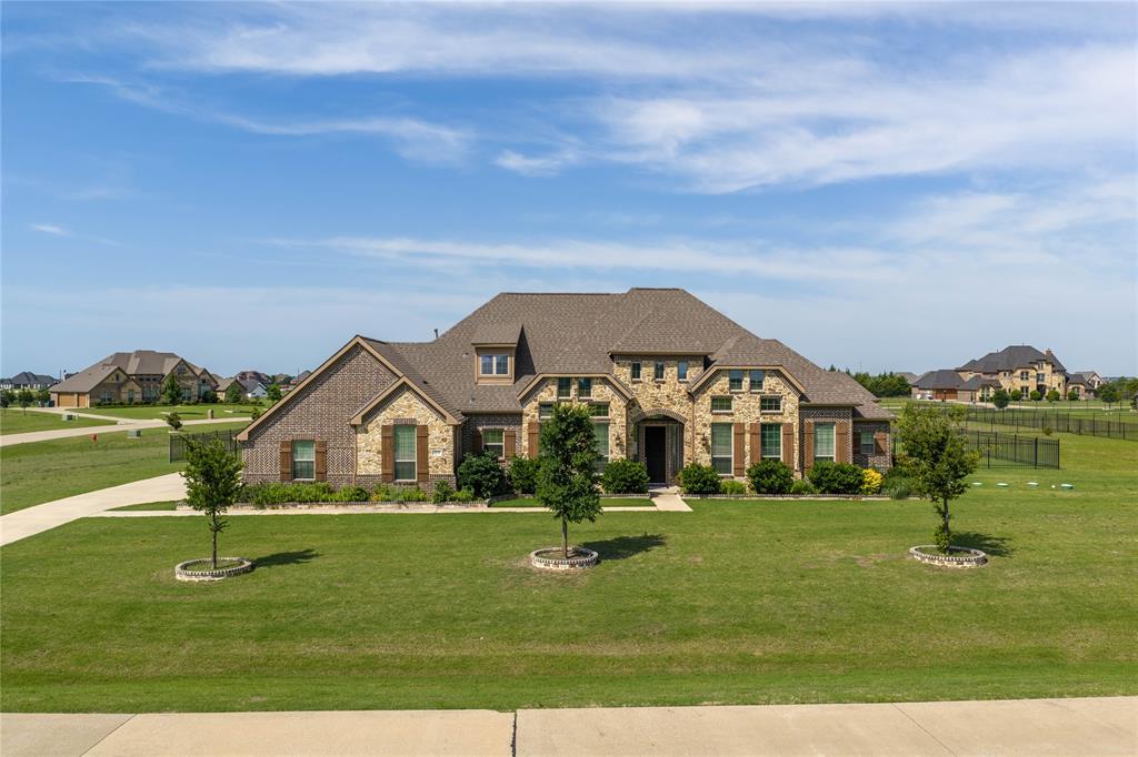 Experience comfort, space, and privacy in this beautifully designed home set on 1.5 acres within an exclusive gated community. The thoughtful split-bedroom floor plan offers flexibility for families, multigenerational living, or long-term guests while maintaining an open, connected feel.This 4-bed, 3.5-bath, 3 car garage home features an inviting open-concept living area anchored by a striking rock-stone gas fireplace. Tall windows fill the space with natural light and overlook the expansive backyard. The seamless flow between the living, kitchen, and dining areas creates an ideal setting for everyday living and entertaining.The chef’s kitchen includes a large center island, dual sinks, gas range, pot filler, abundant cabinetry, a walk-in pantry, and a butler’s pantry connecting to the formal dining room. A dedicated home office with French doors and a closet offers privacy and versatility.The primary suite provides a peaceful retreat with separate vanities, generous cabinetry, a garden tub, double-spray walk-in shower, and a large 14x12 walk-in closet. Three additional bedrooms sit in their own wing with a private living area and shared Jack-and-Jill bath. Another full bath serves a separate private bedroom—ideal for guests or a mother-in-law suite. The laundry room includes a built-in sink, storage, and workspace.An oversized three-car garage offers ample room for vehicles, storage, or hobbies. The expansive lot features a full sprinkler system and a tranquil setting just minutes from Highway 548 and Highway 205. Recent updates include a new roof (2023) and new kitchen counters (2022).