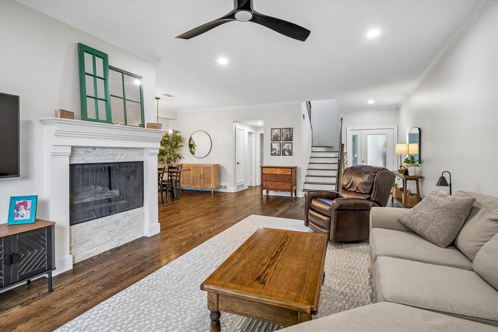 Nestled along the greenbelt in the sought-after Preston Square community, this beautifully updated townhome blends modern style with timeless comfort. Freshly painted throughout, the home features rich wood floors downstairs, new carpet, and serene greenbelt views from the living room, primary suite, kitchen, and breakfast area. The updated kitchen is a standout, featuring sleek quartz countertops, stainless steel appliances, and stylish designer hardware. The spacious three-bedroom floor plan includes two bedrooms upstairs, highlighted by an expansive primary suite with two large closets, while the versatile downstairs bedroom can easily function as a second living area, guest suite, or private home office. Enjoy a true lock-and-leave lifestyle in this hidden-gem community, ideally located near LBJ, the Dallas North Tollway, Galleria and NorthPark shopping, and an array of exceptional dining options. DFW and Love Field airports, private schools, downtown Dallas, parks, and recreational amenities are also within easy reach. Community amenities include a large swimming pool, two tennis courts, clubhouse, and beautifully landscaped green spaces throughout. Offering a peaceful setting with exceptional convenience, this inviting townhome is perfectly positioned for comfortable living and easy access to all that Dallas has to offer.
