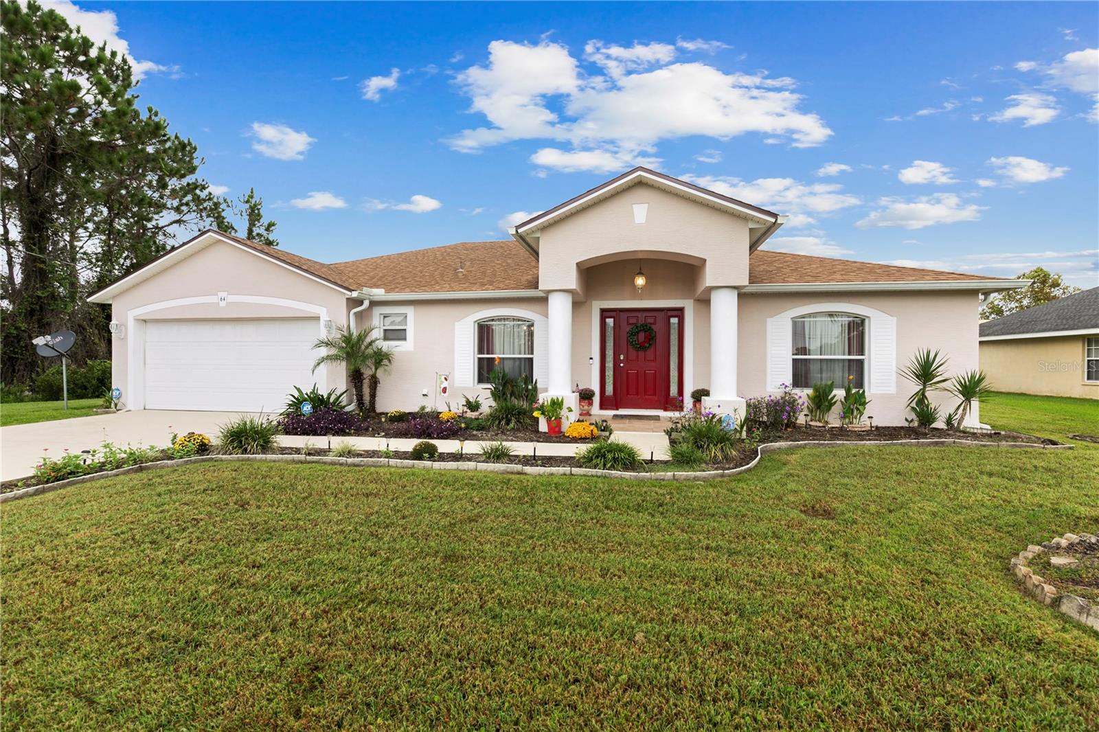 Meticulously maintained by the original owner, built by Holiday Homes, this solar-heated pool home offers 2,020 square feet, 3 bedrooms, and 2 baths. Premium laminate wood-look and water-resistant flooring runs throughout the living areas and bedrooms, with ceramic tile in the entry, kitchen, laundry room and bathrooms-NO carpet. The kitchen features an island with newer granite countertops overlooking the family room and pool area, plus brand new Frigidaire refrigerator, dishwasher, and electric range. Recently painted are the ceilings, garage floor, driveway, and pool deck. The spacious primary bedroom offers a walk-in closet, and room for a sitting area, home office or nursery.  The primary bath offers a garden tub, great for soaking in after a long day. Enjoy the backyard with the tall, leafy hedges to enhance your privacy while swimming in the solar-heated pool with a waterfall accent, pool installed in 11/2020. Plant lovers will enjoy the area outside the pool, a special place to relax and enjoy your plants. Additional features include a Generac RS5500 portable generator, ADT security system; a Ring doorbell; AT&T fiber-optic internet. Updates include: water heater(2/2022), garage door and all mechanisms(2023), Roof July 2021, A/C July 2020. Other features is a solar attic fan, storm shutters, an 8X10 shed, sprinkler on a well and Sentricon termite protection.