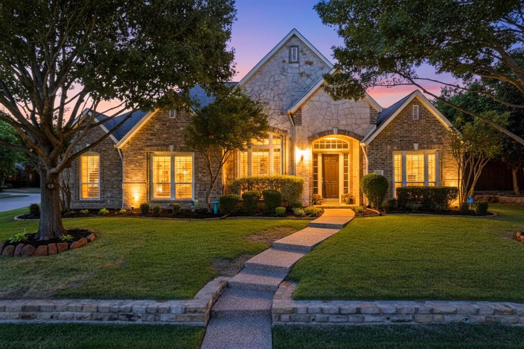 Welcome to this beautifully designed 5 bedroom, 4 bath home perfectly situated on an oversized, one third of an acre, corner lot in the desirable Hunters Creek community.  This mostly one-story layout offers 4 spacious bedrooms and 3 full baths on the main level, ideal for effortless everyday living.  The home features rich wood floors throughout most of the main level and an updated kitchen with modern finishes, oversized island and an abundant amount of cabinets.  Private primary suite overlooking the pool and backyard with updated master bath and custom built ins in primary closet. Upstairs you will find a private retreat featuring a large media room, game room, and an additional bedroom and full bath - perfect for guest or extended family.  Step outside to your personal paradise with a resort-style pool and spa, outdoor living area with fireplace, outdoor kitchen with multiple sitting areas for enjoyment. 3-car garage with gated driveway. Beautiful plantation shutters throughout home, new carpet and fresh paint. New AC 2023 Close to 121, DNT and 75.  Close to the new PGA and HUB 121 entertainment district. Exemplary schools in Frisco ISD