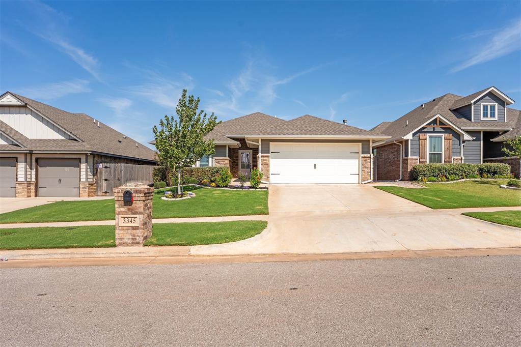 This beautiful 4-bedroom, 2-bath home offers thoughtful details throughout. The 2-car garage includes a built-in storm shelter for peace of mind. Inside, the spacious living room features a corner stacked-stone fireplace, large windows that flood the space with natural light, and an open layout to the kitchen—perfect for entertaining. The kitchen is a showstopper with a large corner pantry, quartz countertops, tile backsplash, cabinets extending to the ceiling, and eye-catching pendant lighting.

The master suite boasts a raised ceiling design and a luxurious bathroom complete with a Jetta tub, oversized walk-in shower, and an expansive closet with convenient access to the utility room. Outdoor living is just as impressive, with a covered back patio that includes a fireplace, gas line hookup, and cable outlet—an ideal space for relaxing or hosting guests year-round.
