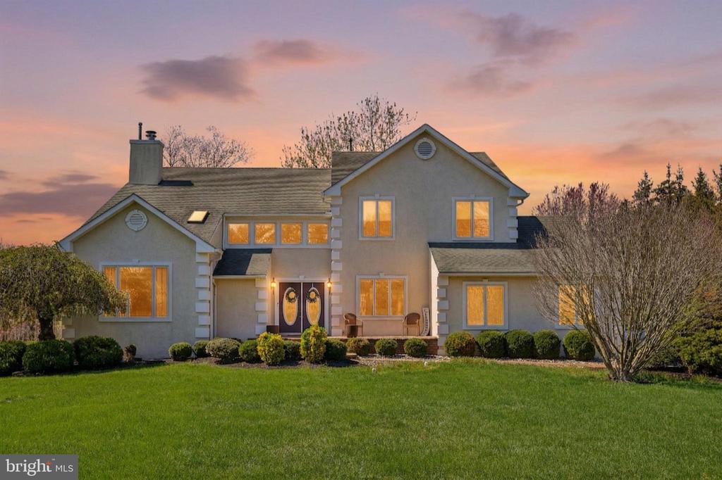 Welcome to 16 Dogwood Dr, a beautifully maintained four-bedroom, three-bathroom home nestled on approximately 1.25 acres in the highly desirable Dogwood Acres community—a private enclave of custom homes known for its peaceful setting and convenient location. Step inside to a grand two-story foyer that sets the tone for this elegant yet functional home. The main level offers a thoughtfully designed layout, including a living room, a spacious family room with a cozy fireplace, and a formal dining room perfect for gatherings. The gourmet kitchen serves as the heart of the home, featuring granite countertops, stainless steel appliances, custom cabinetry, a center island with seating, and a large pantry. A bright breakfast nook with direct access to the deck provides the perfect spot for casual dining. This level is complete with a full bathroom, laundry room, and convenient access to the two-car side-entry garage.Upstairs, the primary suite serves as a true retreat, featuring a private loft or sitting area filled with natural light, and a well-appointed en-suite bathroom with dual vanities, a soaking tub, and a separate shower. Three additional spacious bedrooms, each with ample closet space and thoughtful details, share a full hallway bathroom, completing the upper level.The finished basement provides an impressive extension of the home’s living space, offering a versatile bonus room, a dedicated office ideal for remote work or study, and additional storage. Whether used as a recreation area, home gym, or media space, this level adapts easily to your lifestyle needs.Step outside to your own private backyard oasis. The expansive deck and patio create the perfect environment for entertaining, complete with a designated grilling area and plenty of room for gatherings. The beautifully landscaped, tree-lined property offers both privacy and serenity, while the underground sprinkler system helps maintain the lush grounds with ease.Additional highlights include custom moldings, updated lighting fixtures, and ceiling fans throughout Ideally located near Burlington Country Club, local parks, shopping, dining, and major commuter routes, this home offers the perfect blend of privacy, space, and convenience.Don’t miss this exceptional opportunity to own a stunning home in one of the area’s most sought-after neighborhoods, schedule your private tour today!