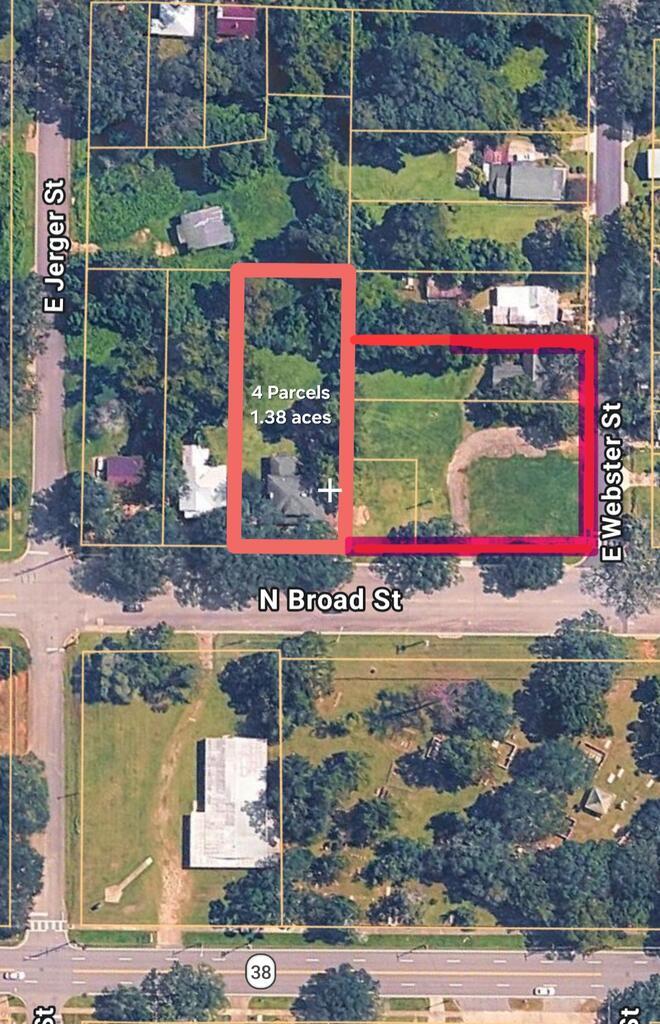Historic Broad Street Assemblage — Thomasville, GA 718, 712 & 700 N. Broad St. plus 111 E. Webster St. | Sold Together A rare opportunity to acquire a 1.38-acre assemblage of four contiguous/adjacent parcels in the heart of Thomasville, Georgia — anchored by a piece of the city's history and positioned for infill redevelopment. 718 N. Broad St. — The Historic Parsonage (0.54 acres) The centerpiece of the offering: a 2,160-square-foot historic home built in 1876 and long used as the parsonage for Saint Thomas African Methodist Episcopal Church. Renovated in 1976, the home retains its historic character and sits on over half an acre with a detached garage and paved parking/drive. A true legacy property, ready for restoration, adaptive reuse, or continued residential use. 700 N. Broad St. — Prominent Corner Lot (0.50 acres) Once the site of one of Thomasville's most prominent community churches, this now-vacant, this vacant lot offers a blank canvas on N. Broad St. for new construction, whether a single residence, multi-unit infill project, or community-oriented development. 712 N. Broad St. — Additional Vacant Lot (0.10 acres) A smaller vacant parcel adjoining the assemblage, adding flexibility for lot reconfiguration, additional parking, or expanded site planning. 111 E. Webster St. — Additional Residence (0.24 acres) Rounding out the package, a circa-1896 cottage (984 sq. ft.) just around the corner on E. Webster St., offered as an income, renovation, or redevelopment opportunity alongside the Broad Street parcels. Location & Zoning All four parcels are currently zoned C-1 (Commercial) per Thomas County records and sit within the area targeted by the City of Thomasville's new Traditional Neighborhoods Infill District (TNID) — a voluntary overlay created to encourage workforce and infill housing while preserving neighborhood character. These properties are well positioned for a TNID rezoning application; buyers should confirm current eligibility, process, and standards directly with the City of Thomasville Planning Department before finalizing development plans. The Opportunity Combined, these four parcels offer a developer, investor, or community partner a meaningful footprint near downtown Thomasville — pairing a historic home worth preserving with multiple vacant and improved sites ready for new life. Sold together, this assemblage is ideal for a redevelopment plan spanning restoration, new infill housing, or a mixed approach across the portfolio. Buyers should independently verify zoning, rezoning process and timeline, utility availability, survey/boundary details, and building condition with the City of Thomasville and Thomas County prior to purchase. Contact us today for more information or to schedule a tour of the properties.