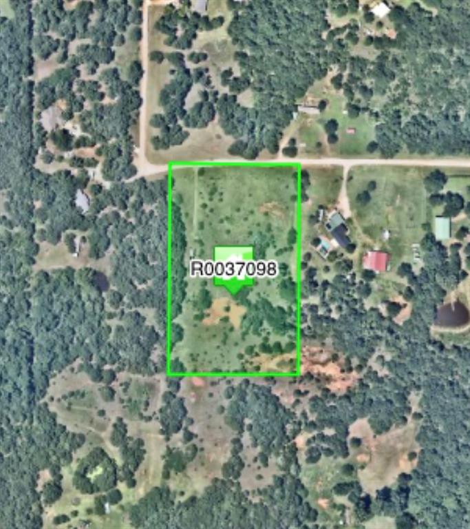 Discover the perfect blend of privacy and convenience with this beautiful and serene 5-acre wooded property, perched atop a hill just minutes from Lake Thunderbird. Enjoy peaceful country living with a fenced yard, a small tranquil pond, and mature trees that provide natural beauty and shade year-round.

The property is already equipped with essential utilities—electric, septic system, and a private well—plus a concrete pad ready for your future well house. An underground storm shelter is in place for added peace of mind. Whether you're looking to build your dream home, set up a weekend getaway, or invest in land with valuable improvements, this property offers endless potential in a picturesque setting.

HOA fee is for road maintenance only.
