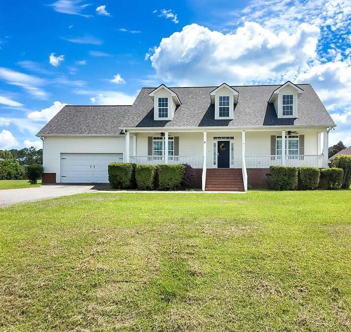SPACIOUS, UPDATED & MADE FOR EASY SOUTHERN LIVING — WITH TWO PRIMARY SUITE OPTIONS, HUGE PORCHES & A BIG BACKYARD NEAR DOWNTOWN THOMASVILLE, GA! If you're searching for a move-in-ready 4-bedroom, 3-bath home in Thomasville, Georgia with two primary suite options, a large front porch, oversized screened back porch, spacious backyard, and convenient access to Downtown Thomasville, this beautifully updated home deserves a look! Situated on a generous 0.61-acre lot, the home offers new flooring, an updated deck, great curb appeal, and a bright, open floor plan designed for comfortable everyday living and entertaining. The spacious dining room is perfect for family meals and special gatherings, while the updated kitchen features granite countertops, stainless steel appliances, and plenty of workspace. The main-level primary suite provides a relaxing retreat with a private ensuite bath featuring a tiled walk-in shower and garden tub, while the upstairs fourth bedroom has its own private bathroom, making it an ideal second primary suite, guest suite, bonus room, home office, or flex space. Outdoor living is a standout feature, with a welcoming large front porch, an expansive screened back porch, and an additional deck perfect for entertaining, grilling, morning coffee, or relaxing at the end of the day. The large 0.61-acre backyard offers plenty of room for children, pets, gardening, play, and outdoor activities, while the oversized two-car garage includes a separate storage room for added convenience. With its modern updates, flexible floor plan, dual-suite potential, big backyard, large porches, and location just a short drive from Downtown Thomasville, GA, this home offers the indoor and outdoor space buyers are searching for. Some rooms have been virtually staged to help buyers visualize how the spaces could be beautifully furnished and enjoyed.