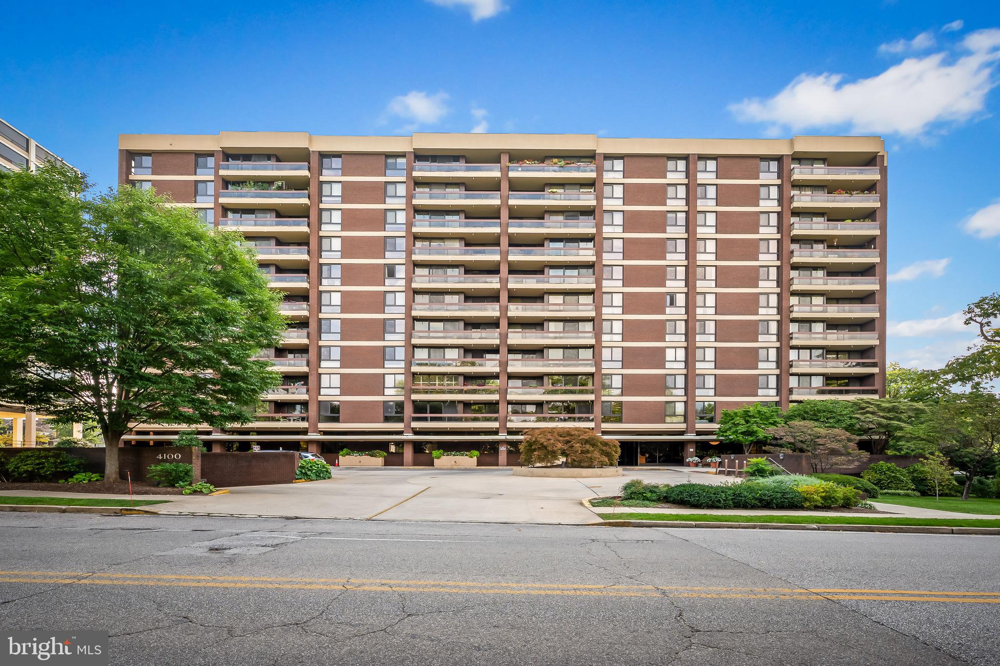 Every inch of this 1,500 square-foot condominium has been thoughtfully remodeled and meticulously curated. Featuring resurfaced ceilings and an open-concept floor plan, the home offers a seamless blend of style and functionality. Custom blinds are installed throughout, adding both sophistication and privacy.The dining area is enhanced by a custom built-in sideboard with abundant storage, perfect for both everyday living and entertaining. Just off the kitchen, a sophisticated wet bar showcases handsome glass countertops and a wine refrigerator, creating an ideal space for hosting. Both bedrooms are generously sized and feature walk-in closets, providing exceptional storage and comfort. Additional built-ins and thoughtfully designed spaces throughout the home offer ample storage solutions. Step onto the enchanting balcony—perfect for morning coffee, quiet relaxation, or tending to your plants—while enjoying lovely treetop views. This residence includes two deeded garage parking spaces, one with a convenient storage locker. The comprehensive condo fee covers all utilities, providing exceptional value and ease of living. Residents enjoy a full-service building with long-tenured, friendly, and attentive staff, along with amenities including guest suites available for rent, a fitness room, a recreation/meeting room with kitchenette, and an outdoor pool. Ideally located with easy access to nearby universities, Charles Village, Hampden, the Baltimore Museum of Art, and the beautiful Sherwood Gardens. Welcome home!