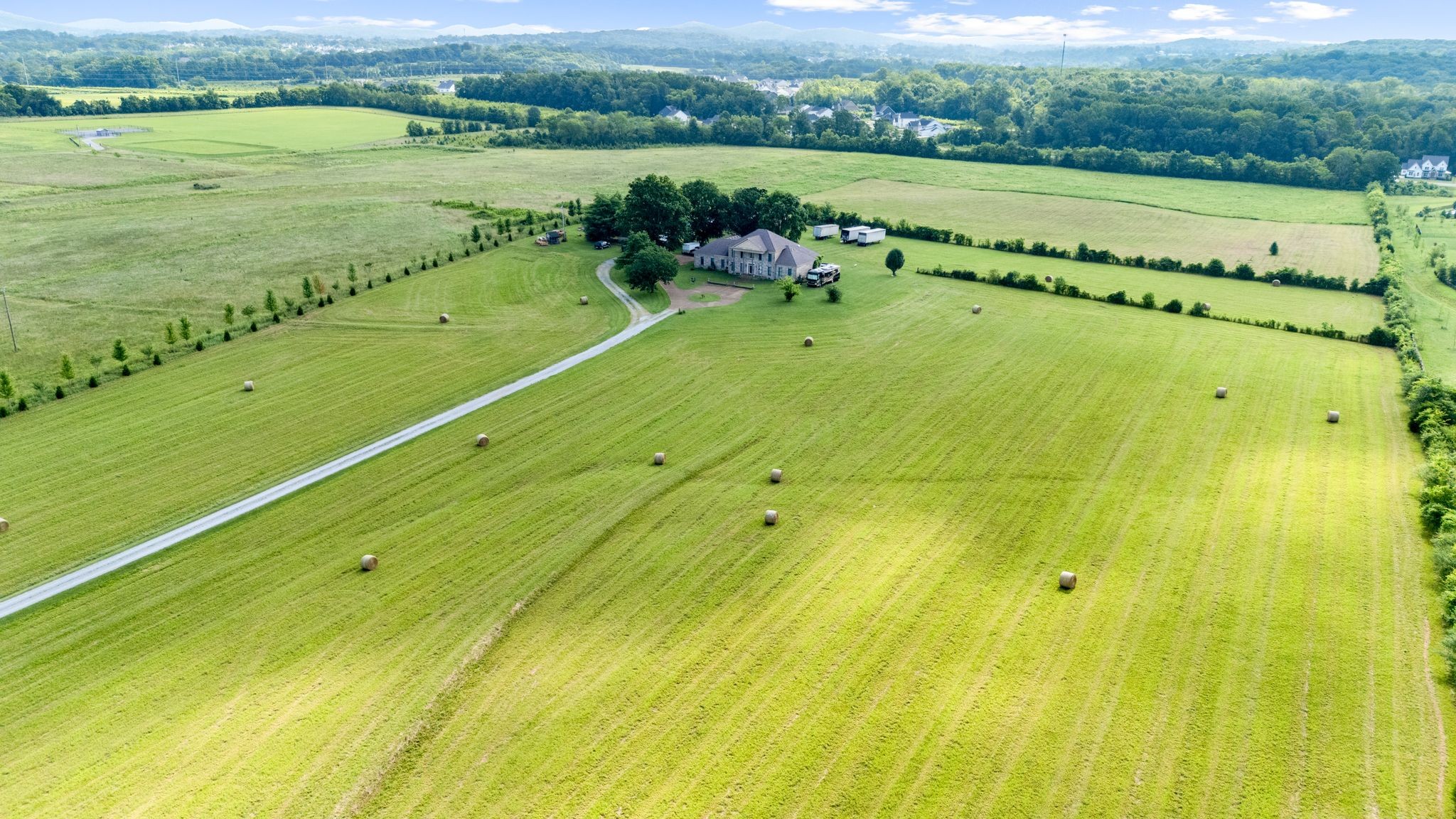 Discover the perfect blend of privacy, potential, and natural beauty in this 26.75-acre property in the highly sought-after community of Arrington. Nestled in a serene countryside setting, the property features a spacious 5,400-square-foot estate home, ready for your personal vision and updates. Whether you dream of a peaceful country retreat, a multi-generational family compound, or a custom luxury estate, the possibilities here are endless. Enjoy the gentle rolling landscape, mature trees, and tranquil atmosphere just minutes from the charming Arrington Vineyards—where live music, local fare, and award-winning wines await. Preliminary soil testing is underway, offering future development opportunities. Located just a short drive from Franklin and downtown Nashville, with easy access to Murfreesboro Road and I-840, this rare offering is your chance to own a slice of Tennessee paradise. Zoned to brand new Arrington Elementary and Page schools.