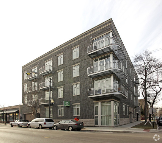 *LOGAN SQUARE- NEWER ELEVATOR BUILDING- 2 BED/2 BATH     *BUILDING AMENITIES: 1 HEATED Garage parking spot included , storage locker, intercom. Water, trash/recycling, snow removal included. Tenant pays electric, gas, cable/internet.     *APARTMENT AMENITIES:Stainless steel appliances, Granite counter tops, Gas fireplace, Balcony/Outdoor space, modern hardwood floors, Walk in closets, In unit washer/dryer.     *UNIQUE FEATURES: Beautifully designed large open floor plan with contemporary finishes. A spacious living area with a beautiful gas fireplace.  The kitchen features a granite island and countertops with plenty of cabinet space.  The master bedroom showcases a large closet with custom built organizers, perfect for any size wardrobe. Master bathroom has a dual vanity and luxurious spa quality shower. The second bedroom is spacious and has a closet with organizers built in. The guest bathroom includes a tub and shower with granite vanity . Lastly, there are modern floors throughout, complimented by many windows which allows for ample sunlight with a balcony ideal for outdoor relaxing.    *Unit is close distance to Logan Square restaurants (90 Miles, Parsons Chicken, Revolution Brewery), coffee shops etc. Easy 90/94 highway access. Unit is close to public transportation- CTA(California Blue line), and 606 walking trial.     *Designated Managing Broker is related to the owner. Photos shown are of a different unit in the building with same level of finishes.