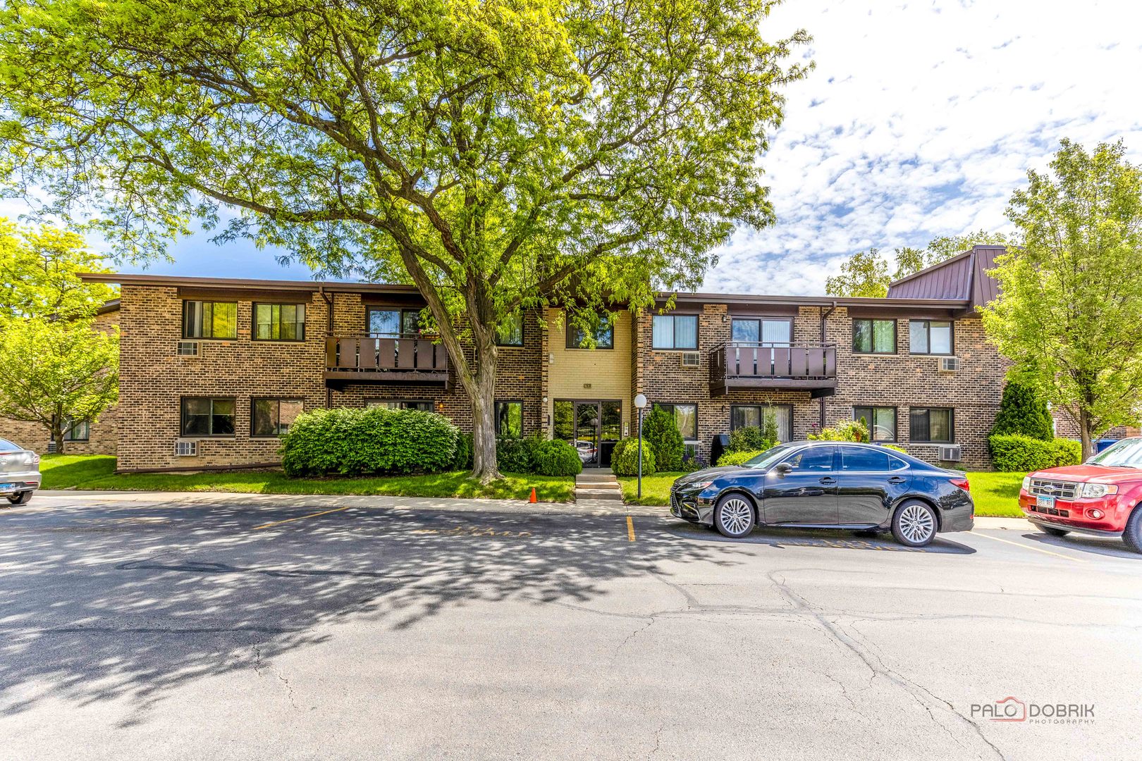 THE BEST DEAL AT WINDSOR WOODS! GORGEOUS, 2 BEDROOMS, 2 BATHROOMS CONDO. PERGO FLOORS LR, DR & HALL AREA, AND ENGINEERING  FLOORS IN THE BEDROOMS. WALK OUT YOUR PATIO TO POOL. ASSOCIATION INCLUDES PARKING (#175), HEAT, GAS, WATER, OUTDOOR POOL, PARTY ROOM, CLUBHOUSE, SNOW REMOVAL, SCAVENGER and EXTERIOR MAINTENANCE. NEW WINDOWS INCLUDED SLIDING DOOR TO THE PRIVATE PATIO. NEW STOVE, DISHWASHER , A/C UNITS, JUST PAINTED T/O, NEW BATHROOMS SINKS AND TOILET BOWLS. HUGE MASTER BEDROOM W/WALK-IN CLOSET. SHOWS LIKE A MODEL! PERFECT CONDITION. CLOSE TO HIGHWAYS, SHOPPING, DINING & LAKE ARLINGTON. JUST ONE BLOCK AWAY FROM THE POPULAR CAMELOT COMMUNITY CENTER (indoor track, basketball court, outside park and pool). NO DOGS ALLOWED BUT CATS, FISH AND BIRDS ARE WELCOME. CONVENIENT PARKING SPOT IN FRONT OF THE BUILDING. NO RENTALS ALLOWED.