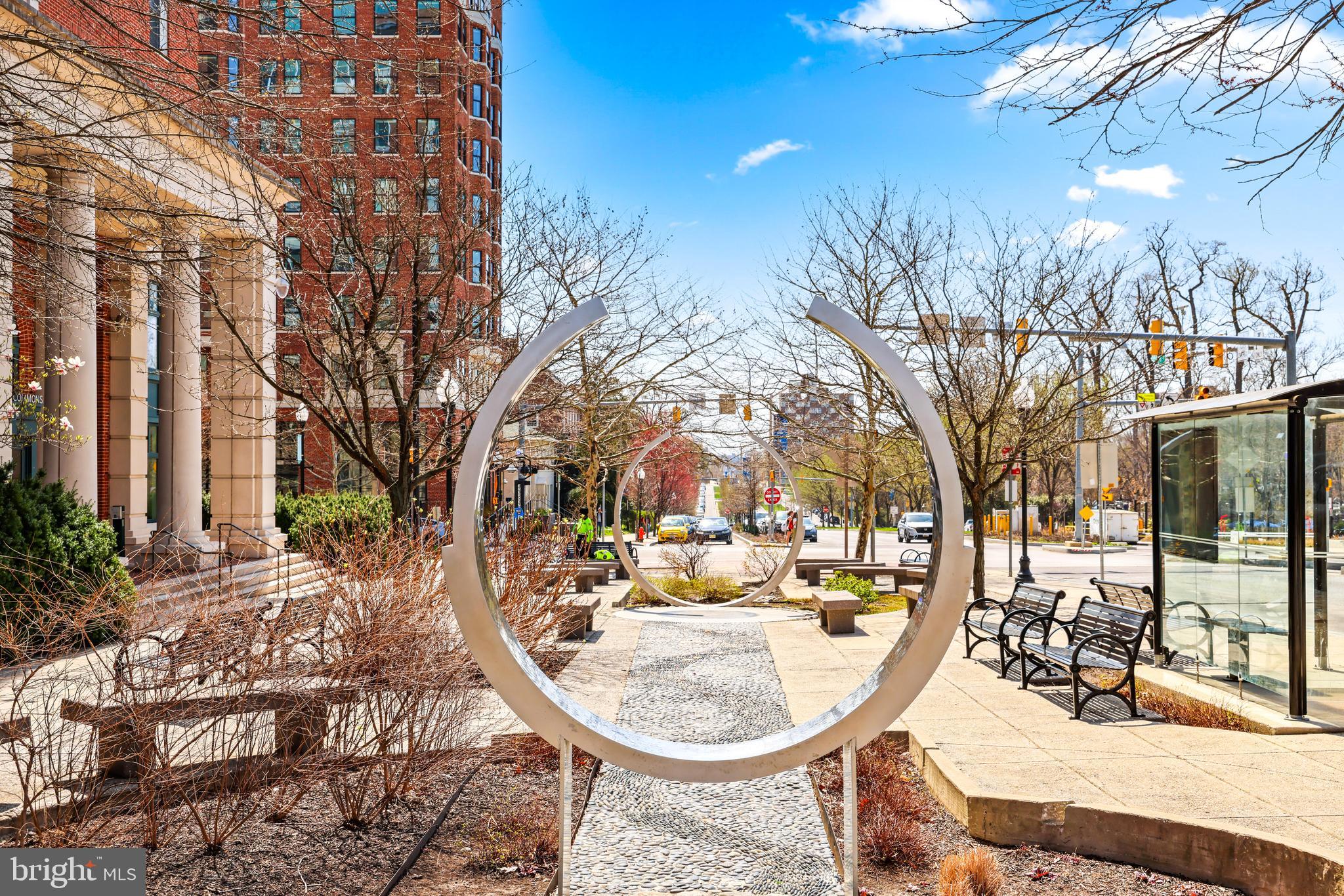 Spacious, Renovated One-Bedroom — Formerly Two Units — Steps from Johns Hopkins in Premier Student Building!!  Rare opportunity in the most sought-after building near Johns Hopkins — this uniquely configured, oversized one-bedroom was thoughtfully combined from two condos to create an open, airy floor plan with generous living space you won’t find in a typical unit. Ideal for students, medical professionals, or investors seeking premium rental potential. The unit is zoned commercial AND residential for those looking for a unique business opportunity as well! Features include: a large one-bedroom layout with expanded living/dining area and flexible study space, well-appointed kitchen with ample cabinet and counter space, abundant natural light and efficient use of the former two-unit footprint, Security-controlled entry for peace of mind, On-site garage parking available. Community amenities: indoor pool, fully equipped gym — steps from the building laundry room.***LOCATION, LOCATION, LOCATION*** Walkable to Johns Hopkins University, top coffee shops, JHU bus stop out front, and campus life. This is the building every student wants to live in — don’t miss a chance to own one of the largest one-bedrooms available in the complex.Schedule a showing today to see how this rare, oversized one-bedroom blends comfort, convenience, and campus proximity.