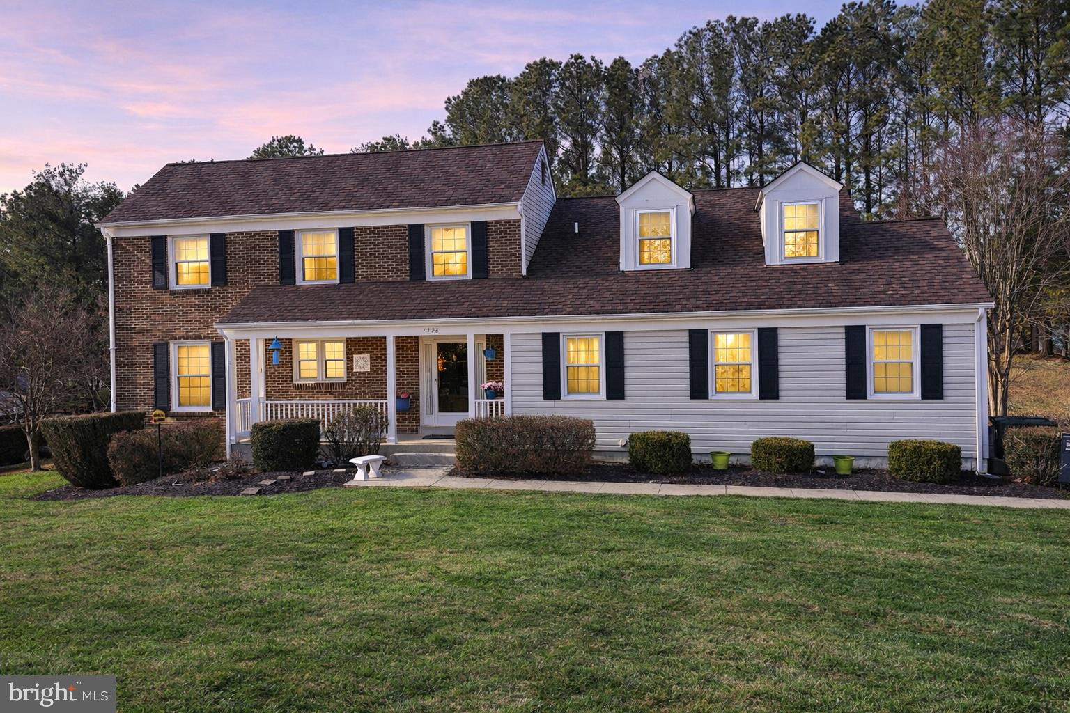 Move into a home you’ll never outgrow!Tucked into the established Lake Fairfax Park Estates community, this classic brick-and-siding Colonial feels like the kind of place you grow into—and never want to leave. Set on over half an acre backing to trees and the beautiful Lake Fairfax Park, it delivers that rare combination of space, privacy, and everyday comfort that’s getting harder to find.Pull into the finished, side-entry two-car garage and take in the gently sloping lot and mature landscaping. You’ll immediately notice how peaceful it feels here. There’s a quiet confidence to the exterior—timeless lines, composite shingle roof, and a welcoming front entry that sets the tone before you even step inside. Open the door of this freshly painted home and the foyer unfolds into a light-filled main level with rich wood floors and a layout that simply makes sense. The living room stretches wide with a brick fireplace and cathedral ceiling, and skylights, creating a natural gathering space that feels just as right for a cozy evening as it does for hosting a crowd.The dining room is perfectly proportioned for everything from weeknight dinners to holiday celebrations, and the kitchen offers a breakfast area that keeps everyone connected. With stainless appliances—including built-in microwave, dishwasher, brand-new refrigerator, and stove—daily routines feel seamless. The adjacent deck extends your living space outdoors, overlooking a deep rear yard framed by trees. Morning coffee out here just hits different.One of the most versatile features is the entry-level bedroom with updated light fixtures and a full bath—ideal for guests, a home office, or a private retreat. Upstairs, the primary suite is truly expansive, complete with a walk-in closet and an en-suite bathroom with new vanity and light fixture. Two newly carpeted bedrooms and another full bathroom, with new vanity light fixture, round out the upper level, offering generous dimensions and flexibility for whatever your lifestyle demands.Downstairs, the full finished lower level with brand new LVP flooring opens up even more possibilities. The enormous recreation room, with a second fireplace, adds warmth and character, giving the home multiple spots to unwind and is ready for movie nights, game tables, workouts, or creative pursuits. There’s a wet bar for easy entertaining, plus an additional finished room with brand-new carpet that can flex as an office, hobby space, or simply a quiet escape. It’s the kind of lower level that adapts as your needs evolve.Luxury vinyl plank flooring adds durability with a clean, modern look. With 3,500 total finished square feet and a thoughtfully designed three-level layout, there’s room to spread out without losing that connected feel.Living here also means enjoying the amenities of Lake Fairfax Park Estates, including community pool, basketball courts, tot lots, and common grounds, all maintained through a low annual HOA. Just minutes from Lake Fairfax Park, Reston Town Center, Metro access, and major commuter routes, you’re positioned for convenience while still coming home to a peaceful, tree-lined setting.This isn’t just a well-maintained Colonial—it’s a home built for real life. For quiet mornings on the deck. For lively evenings by the fire. For seasons of change and growth, all under one roof. The kind of place that feels right the moment you walk in—and keeps proving it year after year.