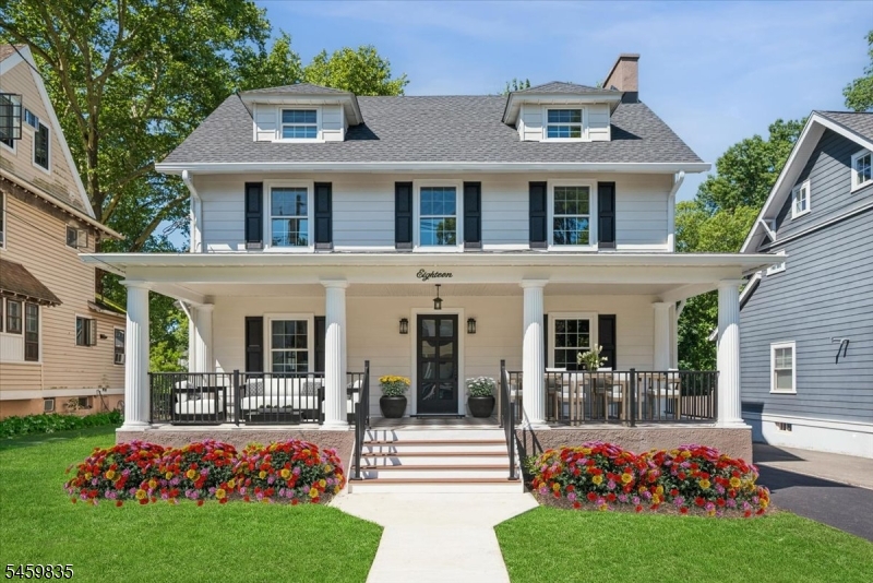Experience this Stunning Turn-of-the-Century Masterpiece, Completely Rebuilt & Finished to Perfection. Located on one of Cranford's Most Desirable Streets, This 5-BR, 3.5-Bath Home is Filled w/Old-World Charm, Where Classic Architectural Design Meets a State-of-the-Art Renovation. Step onto the Glorious Full-Width Covered Front Porch & Enter Thru the Original Glass French-Door into a Spacious Foyer Accented by Classic Columns, Wide Moldings & Custom Millwork Thru-Out. The Foyer Opens Seamlessly into a Spacious LR Featuring a Modern Gas FP, While French-Doors Lead to a Bright & Inviting SunRm/Home Office. On the Opposite Side of the Foyer a Gracious Formal DR Flows Effortlessly into the Stunning Quartz Eat-in-Kit Showcasing Premium Finishes & SS Appls, You Will Fall in Love w/the Brand-New White Oak Floors that Extend Thru-Out All 3 Levels. 2nd Level Offers 3 Spacious BRs, Including a Luxurious Primary Suite w/a Beautiful Full Bath & Oversized WIC + Conveniently Located Laundry. A Beautifully Finished Staircase Leads to the 3rd Level, Where you'll Find 2 More BRs & Another Attractive Full Bath. All This + Brand-New 2-Unit/Multi-Zone Gas Heat/CAC, Windows-Roof- Paved Driveway-New 200-Amp Electric + Outlets/Switches-Updated Plumbing-Drywall-Fully Waterproofed Bsmt, Oversized Garage, New Deck Perfect for Summer BBQs, This Home is Virtually Brand-New Offers the Rare Opportunity to Enjoy Timeless Historic Charm w/the Comfort Efficiency & Peace of Mind of Modern Construction