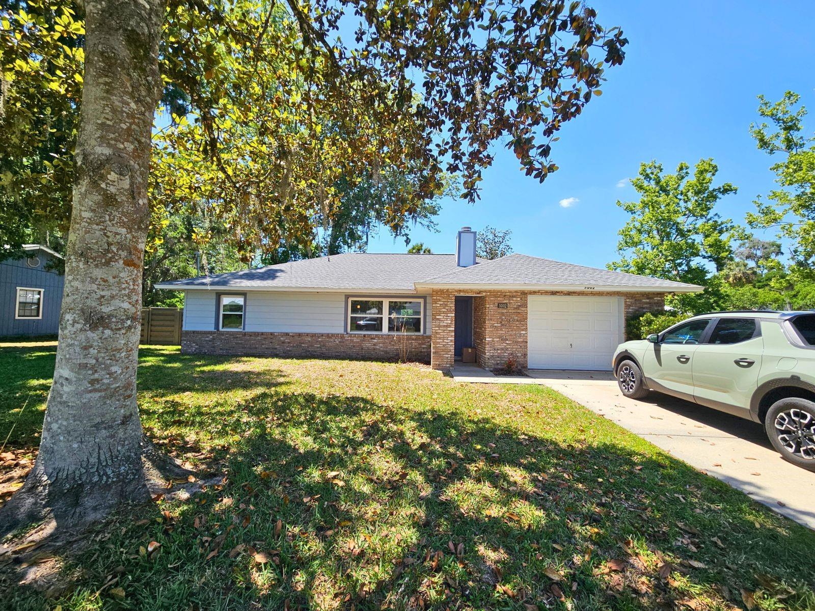 Comfortable, low maintenance 3/2 in quiet SE neighborhood. Recently painted in and out with new roof,windows,floors(2022)AC,kitchen and baths,privacy fence etc (2023/2024).