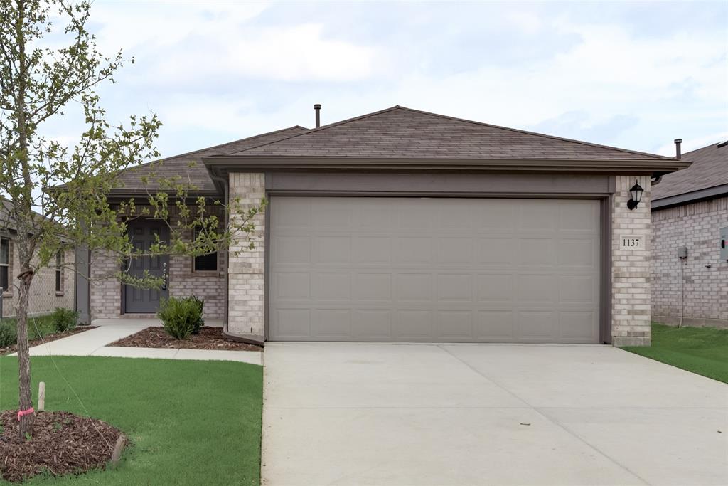 Welcome to your new home! Built by M-I Homes, this is a fantastic opportunity to be the first to live in this stunning home!   The home has beautiful wood like ceramic tiles throughout the home.  The home offers an open living concept with so much natural light. The brand new kitchen comes well equipped with a great long granite island, granite countertops, stainless steel appliances, a gas range stove, and a vented out exhaust! The kitchen opens brightly into your living area and dining, complete for a nice entertaining and relaxation. The primary bedroom is nice in size and has an ensuite bathroom.  The ensuite bathroom has double dual sinks, a large beautiful ceramic tile walk in shower, and huge walk in closet.  The secondary bedrooms are perfect for any style of living.  Additionally, the home includes a separate utility room for laundry, a tankless water heater, and a sprinkler system and so much more!  Don't miss out on this incredible home! Schedule your visit today!