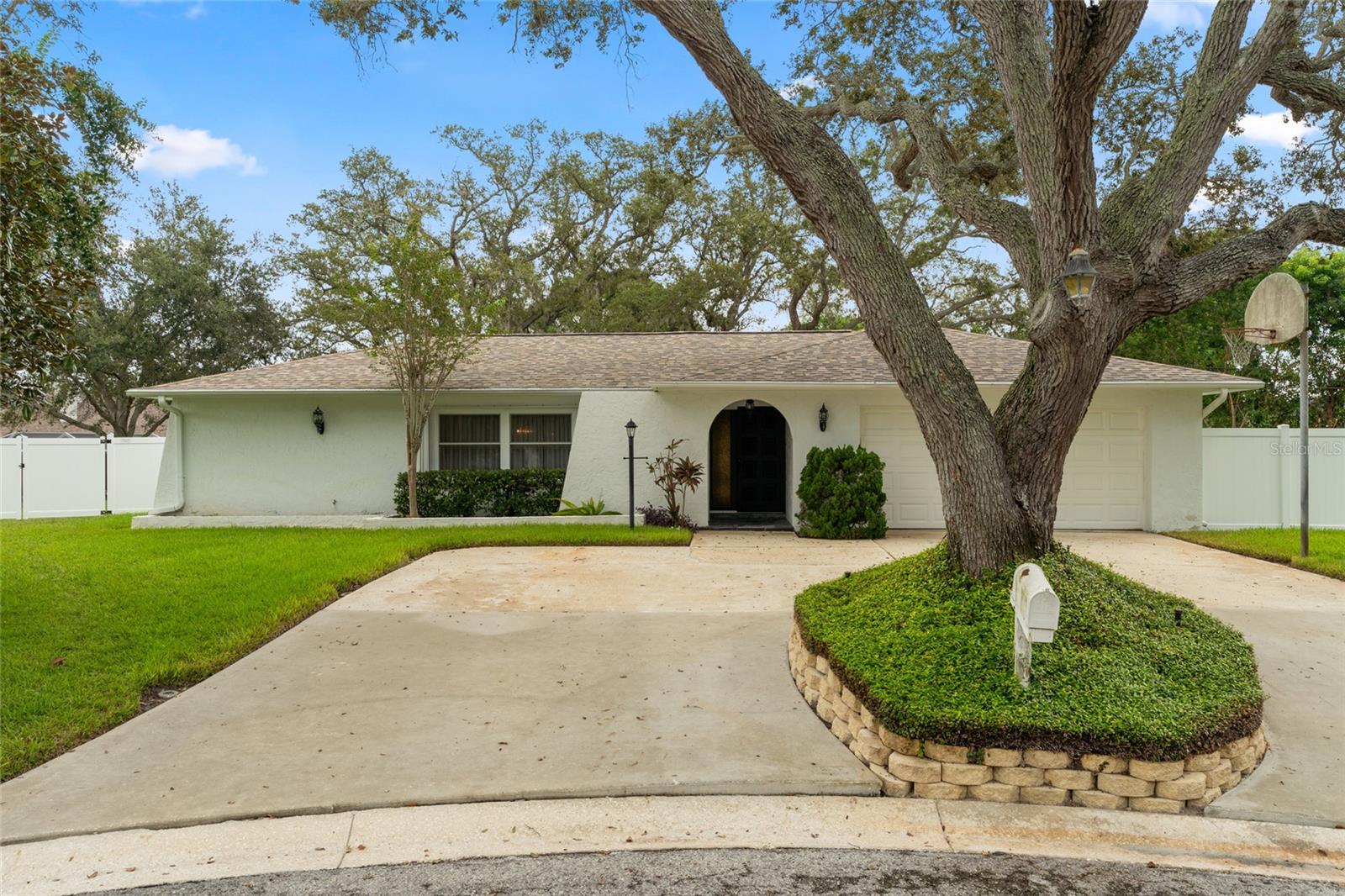 Welcome to 10389 Bay Hills Drive! Where the grass is greener, the skies are sunnier, and the possibilities are as wide as the huge corner lot it sits on! Nestled in the highly desirable Bay Hills neighborhood of Largo, this charming 3-bedroom, 2-bathroom, 2-car garage gem isn’t just a house, it’s your next adventure waiting to happen. The moment you round the corner, this property stands tall with presence and personality. With room to stretch, grow, garden, entertain, or even build that dreamy backyard oasis you’ve been dreaming about. This lot is a rare! Inside, the layout flows like a cool Florida breeze, welcoming, open, and full of potential. Whether you're whipping up meals in a sunlit kitchen, hosting weekend brunch in the dining area, or kicking back in your cozy living space, you'll feel right at home.
Need space for your beach toys, bikes, or bonus hobbies? The 2-car garage has you covered. Craving sunshine and calm? You’re just minutes to Gulf beaches, parks, golf courses, and all the charms of Largo living. So go ahead — dream a little bigger. Welcome home!