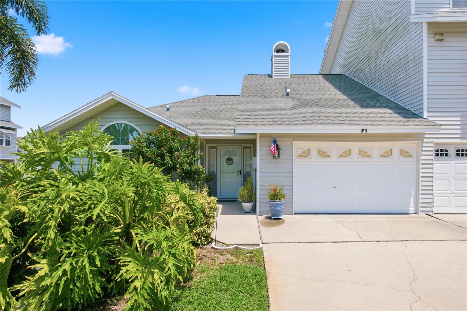 Under contract-accepting backup offers. **COASTAL CONVENIENCE MEETS LOW-MAINTENANCE LIVING.  JUST ONE MILE FROM INDIAN ROCKS BEACH!**Welcome to carefree Florida living in this beautifully maintained 2-bedroom, 2-bath end-unit villa featuring a spacious heated and cooled Florida room and an attached garage. Perfectly situated in Flood Zone X (Non-Flood Zone), this move-in-ready home combines thoughtful renovations, major system updates, and effortless maintenance in one exceptional package.  The seller is willing to sell the unit furnished.  The heart of the home is the beautifully renovated kitchen (2020), complemented by fully remodeled bathrooms (2018) and brand-new luxury vinyl plank flooring installed throughout in 2025, creating a fresh, modern feel from room to room. Major improvements continue behind the scenes with a new air conditioner and air handler (2025), whole-home water softening and filtration system, newer HOA-required electrical panel upgrade, and a hot water heater (approximately 2016) providing comfort, efficiency, and peace of mind for years to come.The exterior has been equally well cared for with hurricane-rated windows (2018) and a lanai roof upgraded to a durable rubber roofing system in 2024, offering an estimated 30-year lifespan.The HOA provides truly low-maintenance living by covering the roof, exterior siding, building insurance, escrow, lawn care, pest control, community pool maintenance, premium cable, and high-speed internet, allowing you to spend less time on upkeep and more time enjoying the Florida lifestyle.Nestled in a quiet, friendly, this hidden gem is surrounded by mature landscaping, this villa offers the perfect balance of privacy and convenience. You'll be just one mile from the sugar-sand beaches of Indian Rocks Beach and within walking distance of shopping, restaurants, and everyday conveniences.Whether you're looking for a full-time residence, seasonal retreat, or investment opportunity, this exceptional villa offers the ideal blend of updated interiors, major capital improvements, low-maintenance living, and an unbeatable coastal location.