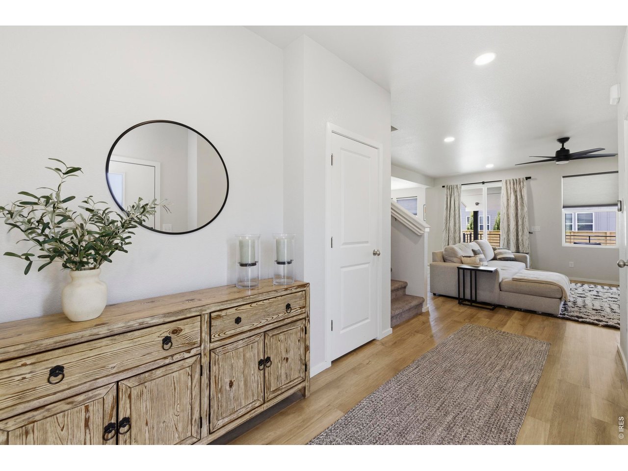 Exceptional value in Mosaic! This popular Hartford Homes Twain floor plan offers 5 bedrooms, 4 bathrooms, a finished basement, and an oversized covered deck on a premium lot siding to green space just a block away from one of the neighborhood pools. The open-concept main level features a dedicated office, quartz countertops, an induction cooktop, luxury vinyl plank flooring, and modern finishes throughout. Upstairs you'll find four bedrooms, including a spacious primary suite with vaulted ceilings and a large en suite bathroom, plus a versatile loft and convenient laundry room. The finished basement adds a generous rec room, fifth bedroom, and full bath. Enjoy all that Mosaic has to offer, including two neighborhood pools, walking trails, and a future City of Fort Collins park. No metro district tax and one of the best values in Mosaic!