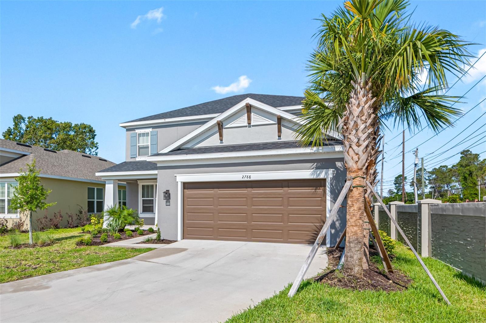 There is 4 spacious bedrooms and 3.5 bathrooms that has plenty of designer touches and upgrades at Silver Ridge community . The main living quarters has beautiful, tile-wood floors that make the home feel warm and inviting. Living room which could also be used as a flex space is adjacent to the dining room. The Bonaire is the definition of traditional charm and livability. The main living area on the first floor combines the designer kitchen, a casual dining area, a gathering room with a two-story ceiling, and the formal dining room for an appealing open-concept feel. For indoor-outdoor entertaining, the sunny lanai spans the back of the home. Back inside, the kitchen holds an angled island and pantry. The downstairs owner's suite offers convenience, privacy, and beautiful style. The suite includes two sizable walk-in closets. Upstairs, the loft overlooks the gathering room. A study is set right off the loft. The 3 secondary bedrooms share two full baths.