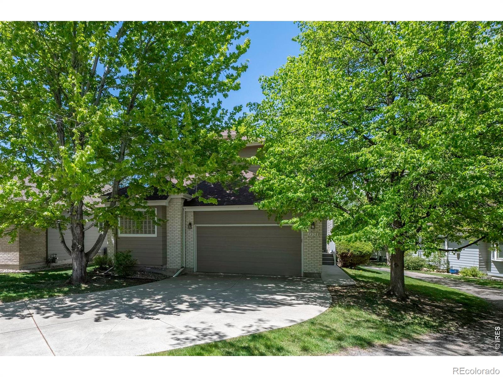 OPEN SUNDAY 1-3 PM! Experience luxury living with low-maintenance convenience in this exceptional 2-story patio home near the Boulder Country Club and backing to lush greenbelts & walking paths. Thoughtfully designed & extensively updated, this elegant patio home offers an open-concept floor plan with soaring ceilings, extensive marble flooring, and desirable MAIN-FLOOR PRIMARY SUITE. The gourmet kitchen is a true centerpiece, featuring custom cabinetry, slab granite countertops, a large center island with seating area, and premium stainless-steel appliances including a Sub-Zero refrigerator, Dacor 6-burner gas range with hood, wine fridge and warming drawer, and seamlessly connects to the spacious dining/living areas with gas fireplace. The main-floor primary suite offers a luxurious retreat with a spa-inspired 5-piece bath complete with a large walk-in steam shower, Japanese soaking tub w/ jets, custom vanities with abundant storage, and radiant heated floors. Upstairs, you'll find 2 generously sized bedrooms with wood flooring connected by a Jack & Jill full bath. One bedroom, featuring French doors, also serves beautifully as a private office or flex space with built-in custom cabinetry. The finished lower level is designed for entertaining and relaxation, showcasing a spacious recreation/family room with wet bar, ice maker, and refrigerator/freezer. A large guest suite with above-grade windows, walk-in closet, and bath provides excellent accommodations for family or guests. Step outside to the expansive back deck overlooking lush greenbelts, creating a peaceful outdoor retreat. Enjoy true Lock & Leave living with HOA-covered lawn maintenance and snow removal. A rare opportunity to enjoy luxury, comfort, and convenience in one of Boulder's most desirable locations.