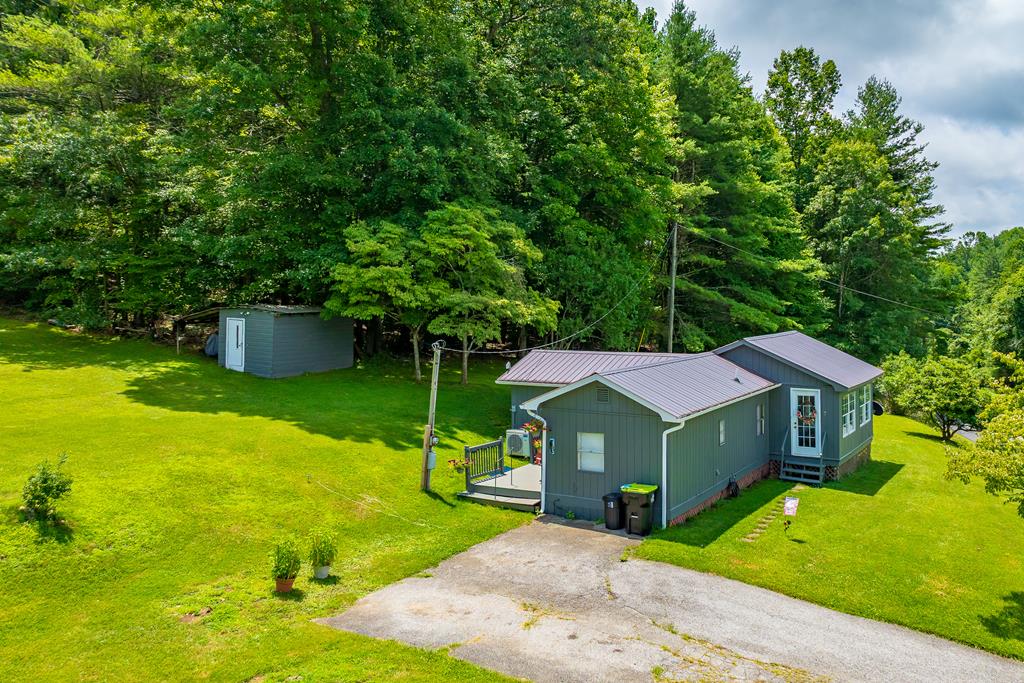 Enjoy stunning mountain views from this super cute, nicely updated 2-bedroom, 1-bath home. This smaller, low-maintenance property is perfect as a starter home or a weekend getaway. Step inside to find tasteful updates throughout, including mini-splits for efficient heating and cooling. Outside, you'll love the oversized yard, paved driveway, and serene setting. Relax on the porch and take in the peaceful surroundings—all just a short drive to the town of Galax. Don't miss this move-in ready gem!