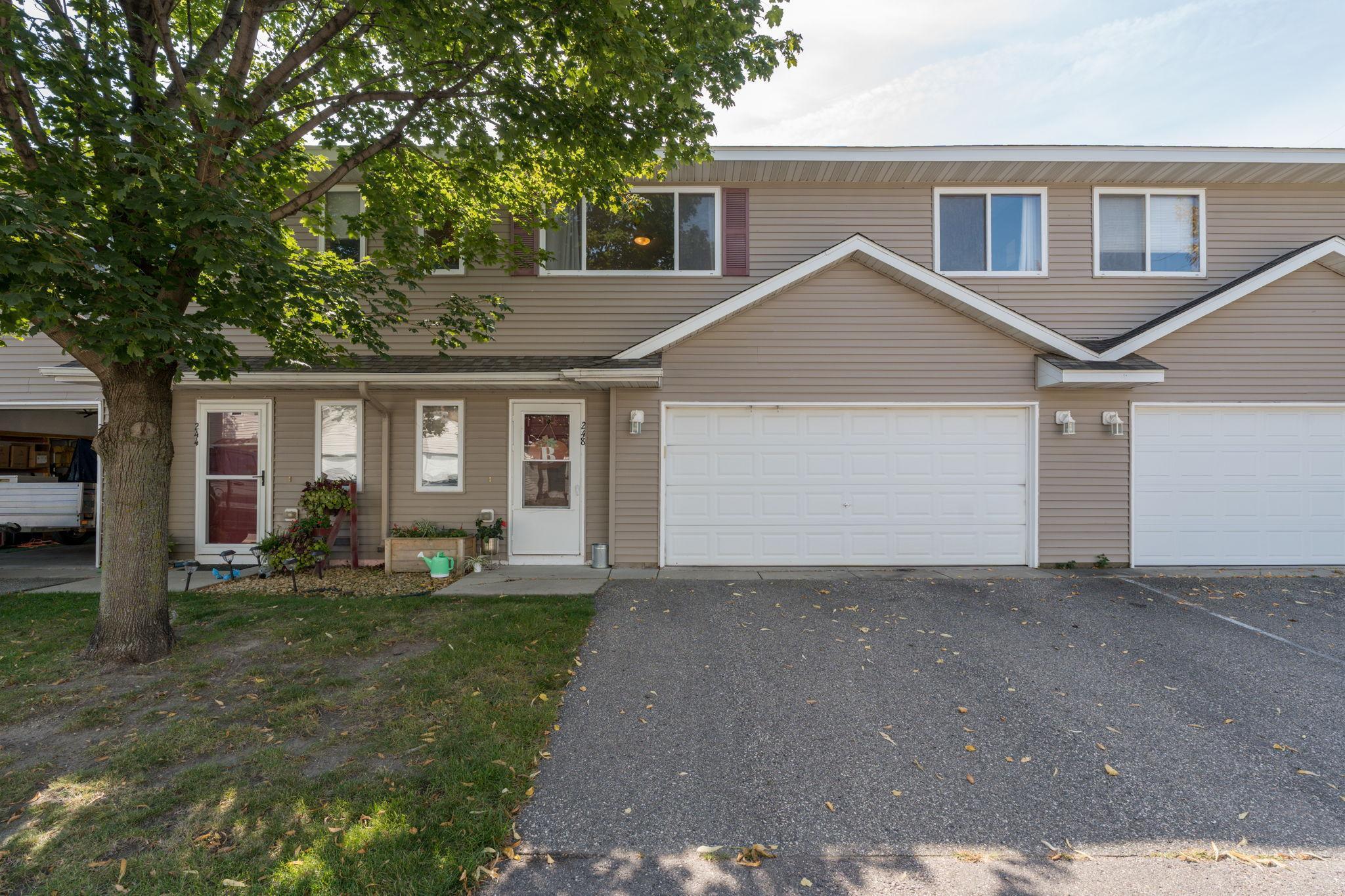 This well-maintained 3-bedroom, 2-bath townhome offers comfort, convenience, and a great location. The attached 2-stall garage makes day-to-day living easier, and the association takes care of exterior upkeep—so no more mowing, shoveling, or yard maintenance. The main floor includes a bedroom, bathroom, laundry and direct access to the garage. The upper level has an open kitchen dining area, spacious pantry, 2 additional bedrooms, and central full bath. This property is move-in ready and offers a low-maintenance lifestyle close to parks, green space, and all that Mankato has to offer. Agent is related to owner.