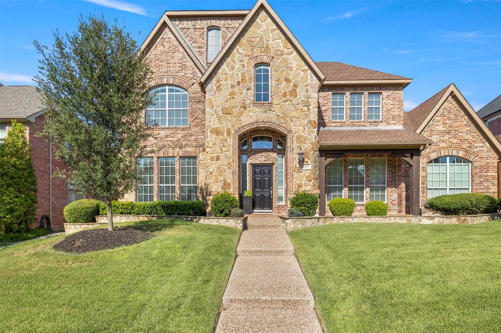 RECENTLY UPDATED TO THE FULLEST AND READY TO MOVE IN WITH NO TO DO LIST TO COMPLETE! AN ABSOLUTE STUNNING CUSTOM HOME FEATURING A HARD TO FIND FLOOR PLAN THAT INCLUDES 4 BEDROOMS WITH 2 DOWN AND 2 UP, DOWNSTAIRS MEDIA ROOM AND UPSTAIRS GAME ROOM!! Welcome your guest to soaring ceilings, a sweeping staircase with wrought iron balusters, 7 inch wide hardwood flooring encompasses the extended entry that flows from front door to back door. Impressive finish out is evidenced in the thick moulding, baseboards, barreled arches and layered pendant lights and brass fixtures. Open concept and easy flow for entertaining at its best, includes elegant dining room with easy access and flow to kitchen and butler's pantry. A bright and open chic kitchen will bring out the culinary artist in you which includes custom shaker style flat panel cabinets with upper glass fronts and champagne bronze hardware, quartz countertops with under mount sink includes a multi functional center island featuring integrated storage and seating with a water fall edge, full quartz backsplash, counter depth refrigerator, Thor commercial grade 6 burner gas cooktop with oversized oven and 44 soft closing drawers and doors. Private primary bedroom offers a bay window which gives you an extended sitting area and brings the outside inside, a spa-feel bathroom offers custom cabinets, sophisticated mirrors, champagne bronze fixtures and a free standing soaker tub. Patterned carpet on the staircase and 7 inch hardwoods upstairs throughout. Two split bedrooms upstairs with a jack and Jill bathroom includes custom cabinets and oversized shower. Open loft and a action packed game room with french doors that has plenty of space for billiard, ping pong, air hockey or poker. The backyard features a partially covered rear patio with pea gravel aggregate with brick trim and a 8 ft privacy fence. Just minutes away from Universal Studios, PGA, schools and shopping. THE PRIDE OF A ONE HOMEOWNER PROPERTY SHOWS THROUGHOUT!!