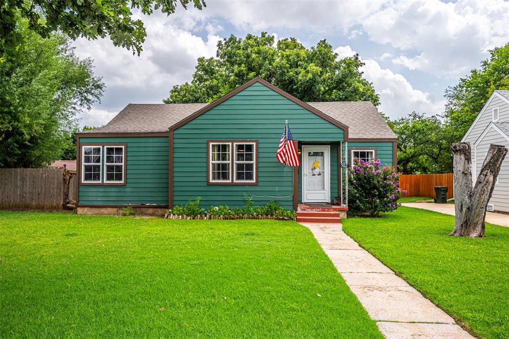 Cute and spacious home on corner lot! Wood floors add historic charm. New roof! Extra storage room on back of house could be used for a multitude of things. Large kitchen and dining area. Seller open to discussing carpet replacement or allowance.