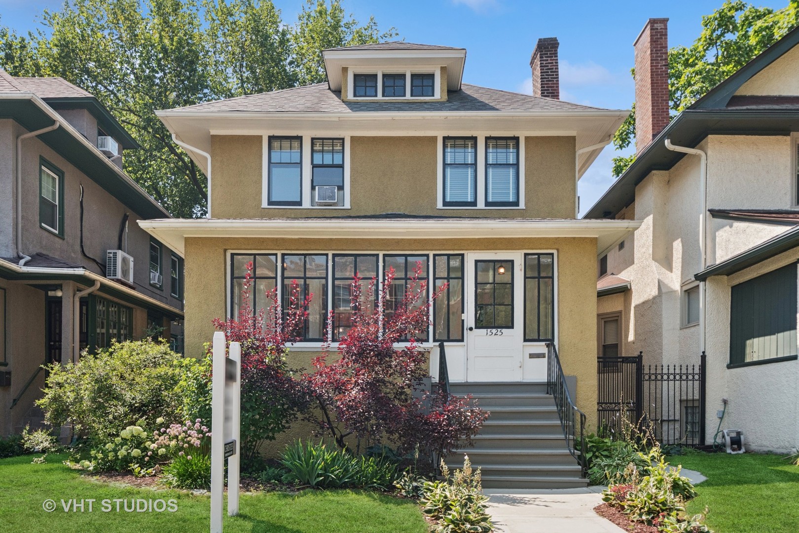 Step into a piece of Rogers Park history with this beautifully preserved 3-bedroom, 2.5-bath Prairie Style home-once the residence of Howard Ure, for whom Howard Street was named. This two-story gem blends timeless charm with modern updates, offering the best of both worlds.                                                                                                                                      From the moment you arrive, you're welcomed by a charming enclosed front porch-an inviting spot to enjoy your morning coffee. Inside, the bright and spacious layout is ideal for everyday living and entertaining. The living room features a generously sized footprint and a well-maintained wood-burning fireplace, perfect for cozy evenings. Original stained glass windows and hand-crafted built-in cabinetry in the dining room add warmth, character, and artistry to the home.                                                                                                                    The renovated kitchen is both stylish and functional, boasting granite countertops, stainless steel appliances, and beautiful wood cabinetry. Well-appointed mudroom/pantry features custom cabinetry, ample counter space, open shelving, and natural light. Conveniently located off the kitchen with direct access to the deck perfect for additional storage, prep space, or a coffee station.                                                                                                                                Upstairs, the primary suite offers a peaceful retreat with two walk-in closets, an updated bath, and an attached sunroom or office space. Two additional bedrooms share a hall bath and offer ample closet space-one even features a unique closet with stairs leading to a full-sized attic, perfect for storage or future expansion.The spacious basement includes a large open area, a separate cellar, and an additional half bath offering plenty of room for storage, hobbies, or future expansion.                                                                                                                            Outside, the magic continues with a huge backyard garden filled with mature perennials, a paver patio, and a deck creating a park-like setting ideal for gatherings, birdwatching, or quiet relaxation under gorgeous old trees. The fully fenced yard connects to the neighboring lot for an expansive, serene feel.                                                                                                      Additional features include hardwood floors throughout, an insulated attic ready for finishing, a full basement, a two-car garage with extra parking, and close proximity to the lakefront.  Enjoy easy access to the Metra, CTA, schools, shops, restaurants, and parks.                                       This is a rare opportunity to own a piece of local history in one of Chicago's most vibrant and walkable neighborhoods. Don't miss it!
