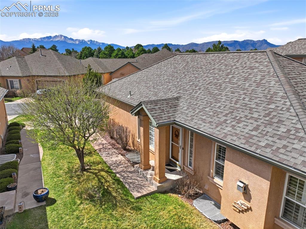 Exceptional opportunity in the coveted University Park area where mature landscapes, open space, and everyday convenience come together * Beautifully maintained ranch style patio home with finished basement offering effortless, low maintenance living in a highly desirable Colorado Springs location with convenient access to shopping, dining, parks & major thoroughfares * Ideally positioned on its lot siding to a large open grassy area that enhances both space and privacy, this home truly showcases pride of ownership from the moment you arrive * Light filled main level features hardwood flooring, vaulted ceilings and custom shutters throughout creating a warm & inviting feel * Spacious great room is anchored by a gas fireplace with tile surround, this space flows seamlessly to a private patio framed by mature landscaping & enhanced by an electronic awning, ideal for relaxing or entertaining * The kitchen is functional with all appliances included, pantry storage, recessed lighting & a comfortable layout for everyday use * Dedicated dining * Main level primary suite offers newer carpet, vaulted ceilings, walk in closet and direct access to the patio, creating a peaceful retreat * Secondary main level bedroom or office is conveniently located next to a full bath and features a new ceiling fan and light * Main level laundry with washer / dryer included is an added bonus * The fully finished lower level expands the home with a generous family room, separate media space, two additional bedrooms, a full bath and ample storage * Home provides flexibility for guests, hobbies, or extended living * Additional highlights include an oversized insulated two car garage with insulated garage door & opener * True main level living paired with a peaceful setting offering both privacy & accessibility * Located in the desirable area with nearby parks and trail access, this is a rare opportunity to own a truly move in ready home in a well established and sought after community * Hurry...