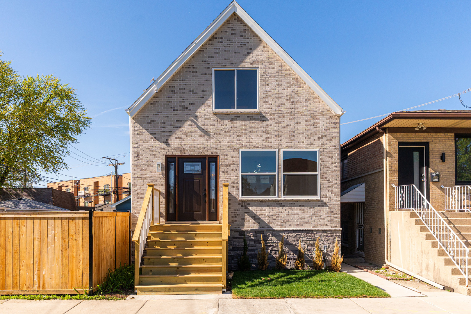 Welcome to this beautifully renovated dream home on a quiet one-way street in the prime Avondale area. Situated on a double, professionally landscaped, Chicago-wide lot, this home features an oversized 3 car garage and new high-end cedar privacy fencing throughout-creating a backyard oasis perfect for entertaining a large crowd. This stunning 4 bedroom, 3.1 bathroom home has been completely rebuilt with all new plumbing, heating, and electrical systems. Notable upgrades include a 1.5-inch new city water pipe, double drywall for all the water pipes, spray foam insulation, and hardwood flooring throughout the first and second floors. The open-concept kitchen is outfitted with white cabinetry, quartz countertops, and stainless steel appliances. The second floor offers three bedrooms and two bathrooms, including a beautiful ensuite in the primary bedroom. The fully finished basement features a large family room, an additional bedroom, and a full bathroom. Conveniently located near shops and restaurants, the Blue Line 'L' stop, buses, and highways. Don't miss this one.
