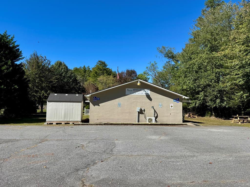 Take advantage of this incredible opportunity to own a commercial building with excellent road frontage and visibility, right off Highway 141 in the Peachtree area! Ideal for a variety of commercial uses, this property is already thoughtfully partitioned, featuring:  a kitchen & break area, 2 bathrooms and a flexible layout to suit your business needs. Whether you're looking to establish a medical office, run a small business, or create an event rental space, this property offers versatility and amazing potential. Don't miss out on this investment opportunity! Call today for more information or to schedule a tour. SOLD AS IS - NO FURNISHINGS. OUTBUILDING NOT INCLUDED.